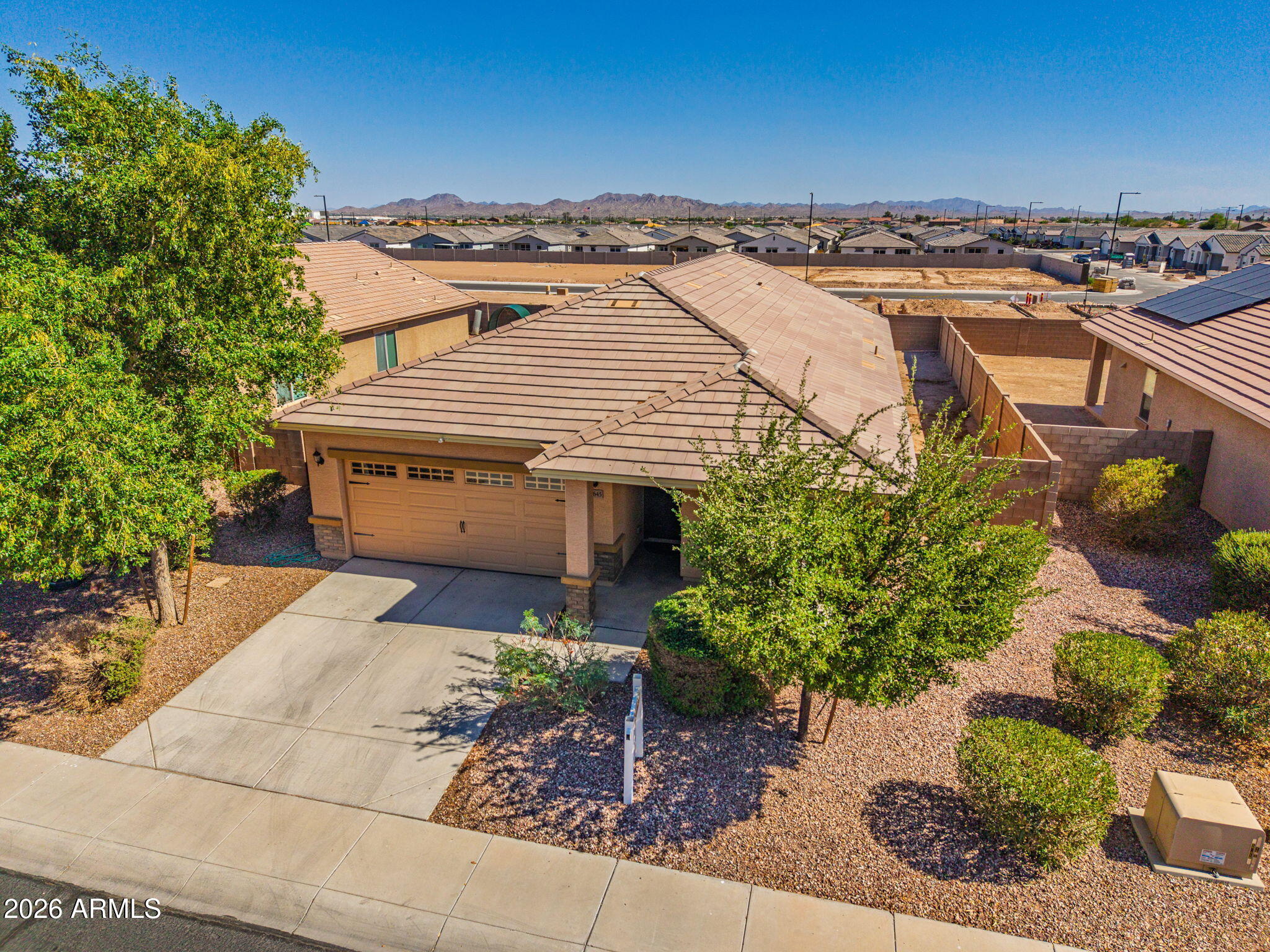 Move into a developed subdivision so your new house  feels like a home from day one! This 3BD/2BA  home has a spacious open feel.  The separate dining area is tiled & flows to the kitchen.  It is perfect for entertaining and everyday living.  The upgraded kitchen has energy efficient appliances (includes the refrigerator), granite countertops, & wood cabinets. The spacious main suite has a walk in closet and private bath.  Outside enjoy a fully fenced backyard with a large covered patio that opens to a true blank canvas ready for YOUR dream backyard vision.   LIVE the GOOD life in this CRYSTAL VISTA COMMUNITY.