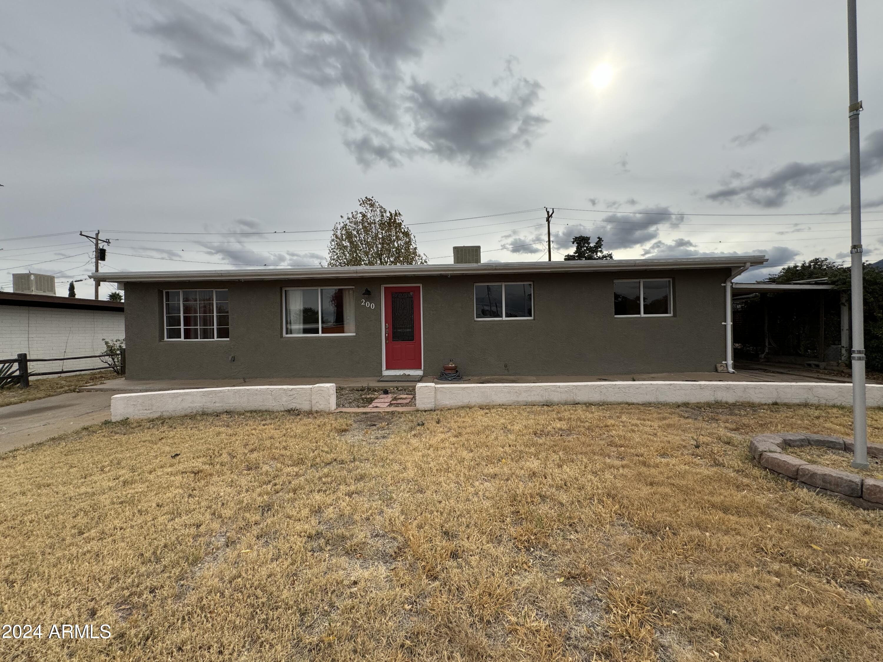 This beautiful 3 Bedroom, 1.5 Bath home with a carport in Sierra Vista, AZ is minutes from Ft. Huachuca, schools, shopping and Canyon Vista Medical Center. Newly RENOVATED, great location, dual pane windows, ceiling fans, & tile flooring! The kitchen features an open floor plan. The master features a walk-in closet, and second room! The property is also fully fenced.