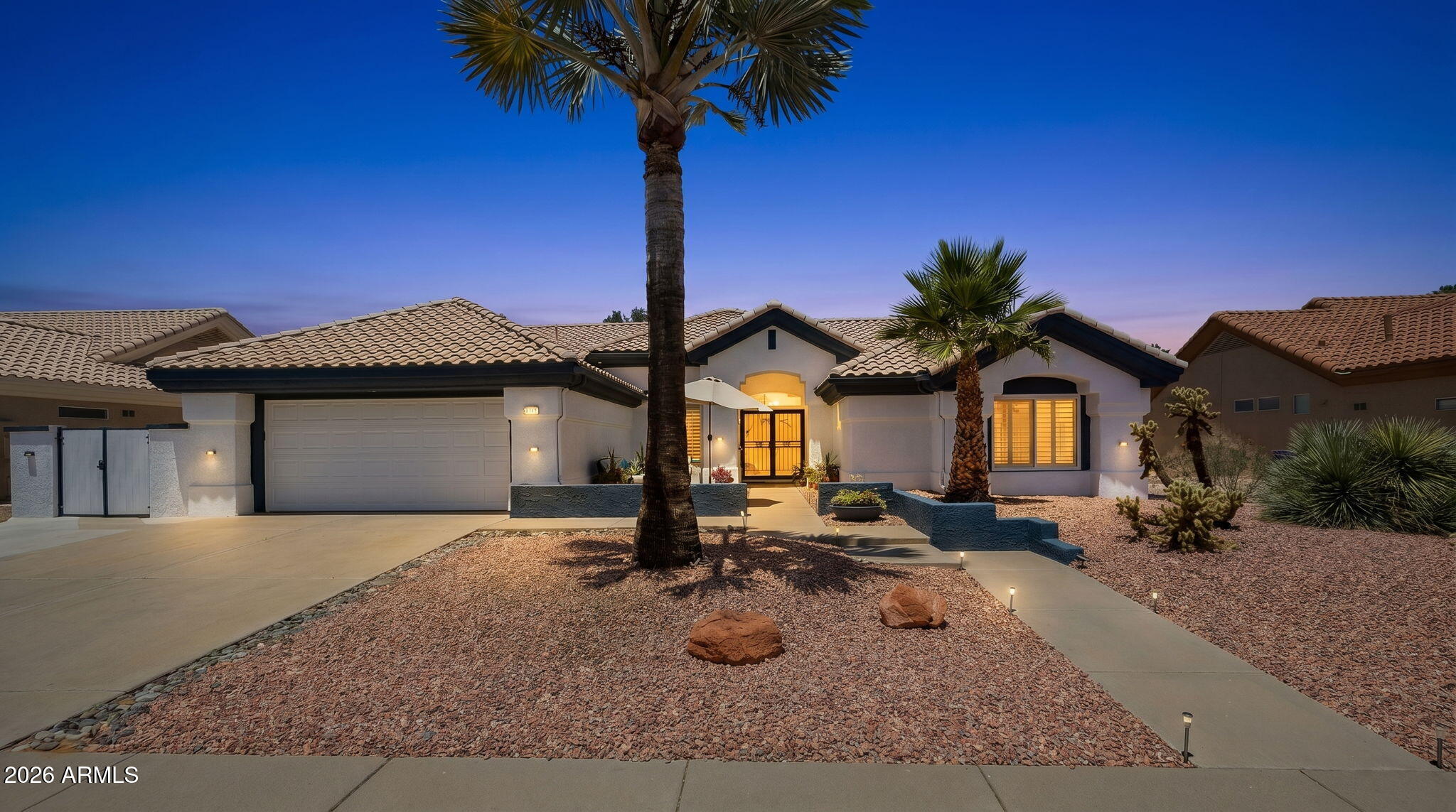 Beautifully updated and move-in ready, this popular expanded Ventana floorplan is located in the heart of Sun City West, Arizona's highly desirable 55+ retirement community. Major improvements include newer roof underlayment installed in 2017, HVAC replaced in 2015, water heater replaced in 2015, updated lighting and ceiling fans throughout, shutters on all windows and doors, tile plank flooring throughout the home including bedrooms and den, and a soft, light interior paint palette. Designed with comfort, flexibility, and everyday elegance, this sought-after floorplan offers 2 private suites, 2 living areas, and a den, along w/an oversized hobby and laundry space featuring a desk area, cabinetry, room for an extra refrigerator, and included washer/dryer. The double-door entry opens into a welcoming great-room with peaceful views of the open backyard. The updated kitchen is both stylish and functional with quartz countertops, white cabinetry, newer appliances, gas cooktop, double-door pantry, recessed lighting, and a center island with built-in cabinetry and pendant lighting. The reinvented primary bath offers a spa-inspired feel with a walk-in shower, soaking tub, dual sinks, solar tubes, and a walk-in closet. Outdoor living is equally inviting with shade trees, a paver patio and pony wall overlooking the open backyard, plus a charming front courtyard with pavers and pony wall--perfect for enjoying the afternoon sun. Side storage shed fenced in, possible golf cart area. A beautifully maintained Sun City West home offering comfort, charm, and an exceptional retirement lifestyle.