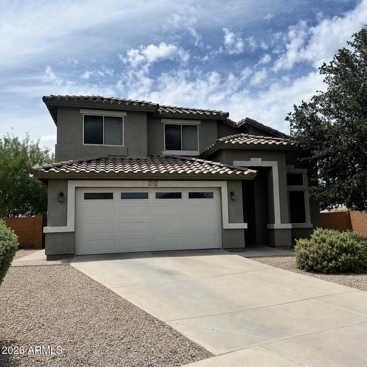 Welcome to this light and spacious home situated on an oversized lot in the highly desirable Maricopa community of The Villages at Rancho El Dorado priced to sell and ready for its next owner! Step inside and you'll immediately notice the fresh designer paint, stylish wide-plank laminate wood flooring, and tile throughout offering a clean, modern look with the added benefit of no carpet. A Trane HVAC system installed in 2020 provides added comfort and efficiency year-round.
The home's vaulted ceilings and abundant natural light create an inviting and versatile front living space perfect for a formal dining area, sitting room, or play space. The kitchen is designed for both function and convenience, featuring a gas stove, generous pantry, and breakfast bar that opens to the great room ideal for everyday living and entertaining. Upstairs, you'll find all four bedrooms, including a spacious primary suite complete with dual sinks, a separate soaking tub and shower, and a walk-in closet. Step outside to your private backyard retreat, where a covered patio overlooks mature fruit trees and dedicated garden spaces. There's even a thoughtfully designed chicken coop, offering a unique opportunity for those interested in a more sustainable lifestyle. Conveniently located and walkable near shopping, dining, and everyday essentials, this home combines comfort, space, and value in one incredible package. Don't miss your chance as homes like this don't stay on the market for long!