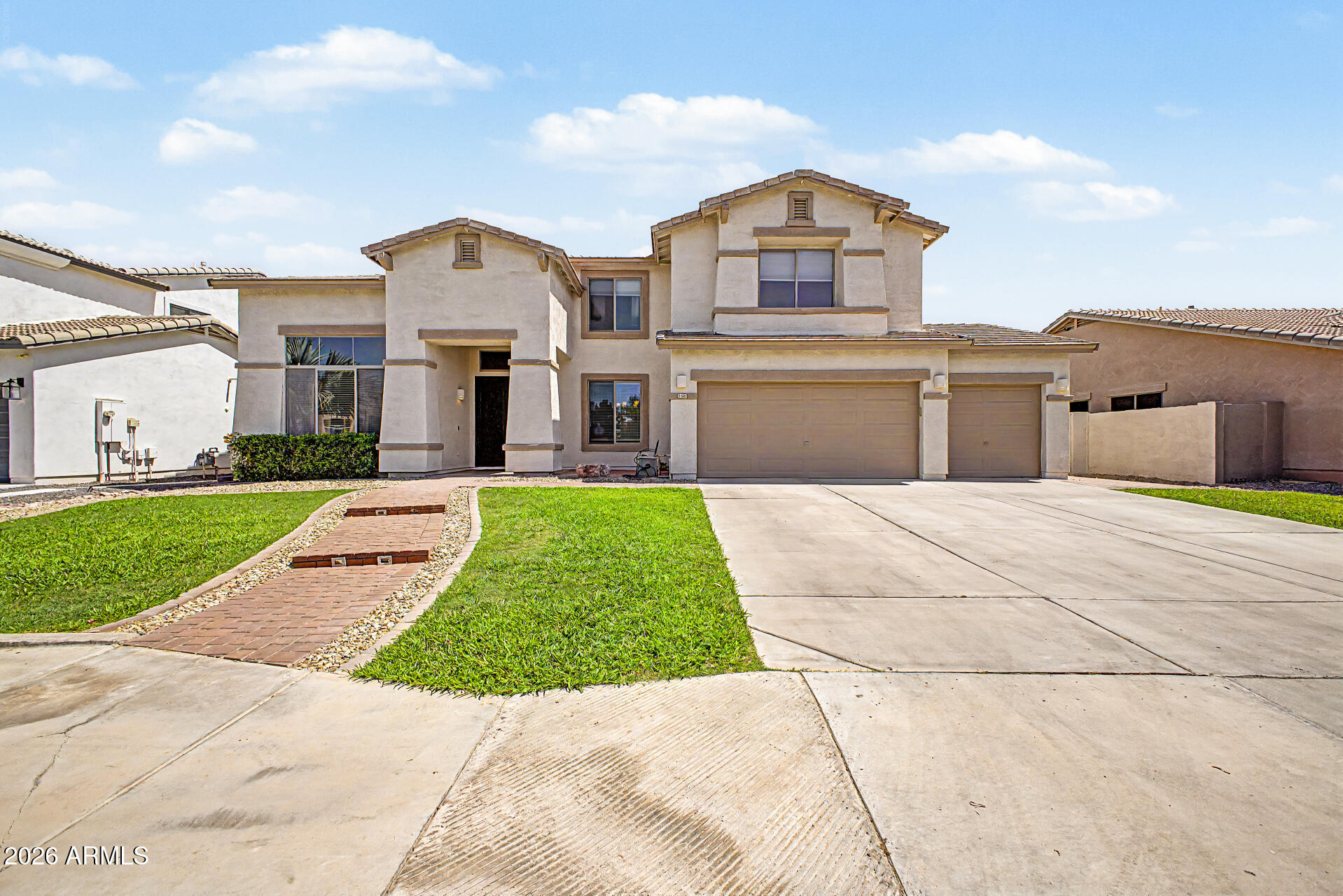 Beautiful 2 story home in the fantastic family neighborhood of Coronado Ranch!  Outside of home was just painted in May.  Plenty of room for your growing family! 4 bedrooms and 2 full bathrooms upstairs with a huge loft for the kids or for a great media area.  Guest room with a full bathroom downstairs.  Beautiful formal dining room with newer vinyl flooring. Separate living and family room with gas fireplace in the family room.  Gorgeous Uba Tuba granite in the kitchen and downstairs bathroom.  Spacious laundry room with laundry chute from upstairs!  Great pool in the back with jacuzzi.  4 car tandem garage with built in storage above in the back.  Gilbert Regional Park within walking distance! This is a great home in a fantastic neighborhood!  Don't wait for this one!  Owner/Agent.
