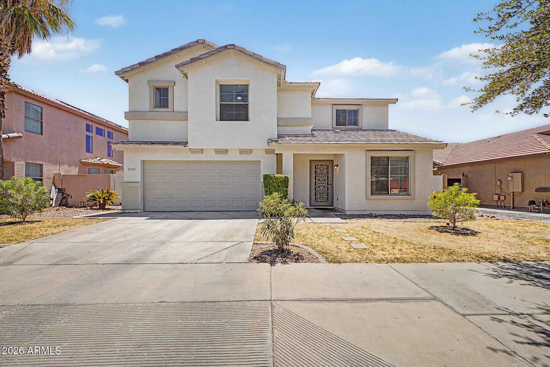 Fantastic opportunity to own this lovely 4-bedroom home in Travertine at Estrella Village! Inside, you'll find a welcoming living room with high ceilings, a soothing palette, blinds, and attractive wood-look flooring. Gather loved ones in the great room, complete with sliding door access to the backyard for seamless indoor-outdoor living. The gourmet kitchen boasts granite counters with a matching backsplash, ample wood cabinetry, and built-in appliances for storing culinary essentials. Upstairs, you'll find a cozy loft, perfect for a reading nook or study. The primary bedroom features carpet, an ensuite with dual sinks, and a walk-in closet. Unwind in the backyard, which offers a full-length covered patio, a charming gazebo, and a fire pit for starlit evenings. Make this yours today!