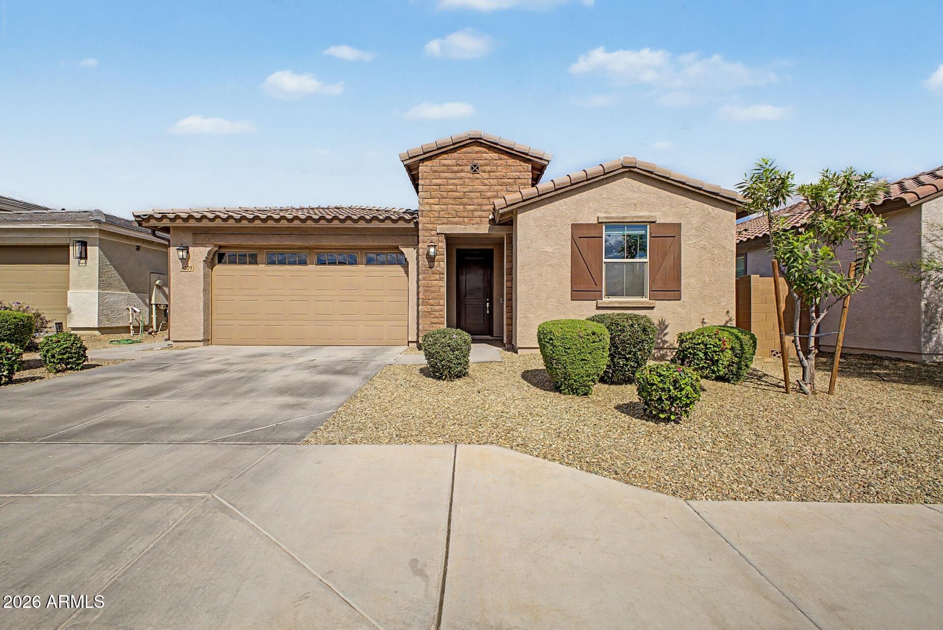 Welcome to this beautifully maintained multi-generational home built in 2022, offering the perfect blend of modern design, flexibility, and functionality. This spacious 4-bedroom, 3-bath residence features a unique layout ideal for extended family living, guests, or rental potential. One of the standout features of this home is the private secondary living corridor complete with its own separate entrance, creating a true next-generation living space. This private suite includes 1 bedroom, 1 full bathroom, a dedicated living area, and its own kitchen perfect for multi-generational living, long-term guests, or added privacy.
The main living area offers an open-concept floor plan with a bright and inviting atmosphere, enhanced by recently completed interior paint throughout. The spacious kitchen seamlessly connects to the dining and living spaces, making it ideal for entertaining and everyday living. Step outside to enjoy a beautifully upgraded backyard with over $10,000 invested in improvements, creating the perfect space for relaxing or hosting gatherings. With newer construction, modern finishes, thoughtful upgrades, and a highly desirable multi-gen design, this move-in-ready home is a rare find offering comfort, versatility, and exceptional value.