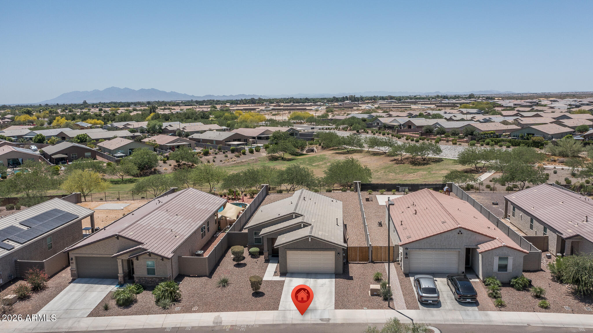 This beautifully maintained original-owner home sits on a premium lot bordering a serene common area and offers 3 bedrooms and 2 baths across 1,296 SqFt of bright, open living. The spacious great room flows into a stylish kitchen featuring maple cabinets with crown molding, stainless appliances, granite countertops, and an island with a welcoming breakfast bar. Sliding doors lead to a relaxing patio and private backyard with a gazebo seating area and view fencing that showcases peaceful greenbelt & mountain vistas. The primary suite includes an en-suite bath with a dual-sink vanity, oversized shower, and a walk-in closet. Additional highlights include a 2-car garage, a convenient double gate, and all appliances are included, making this home move-in ready for you!