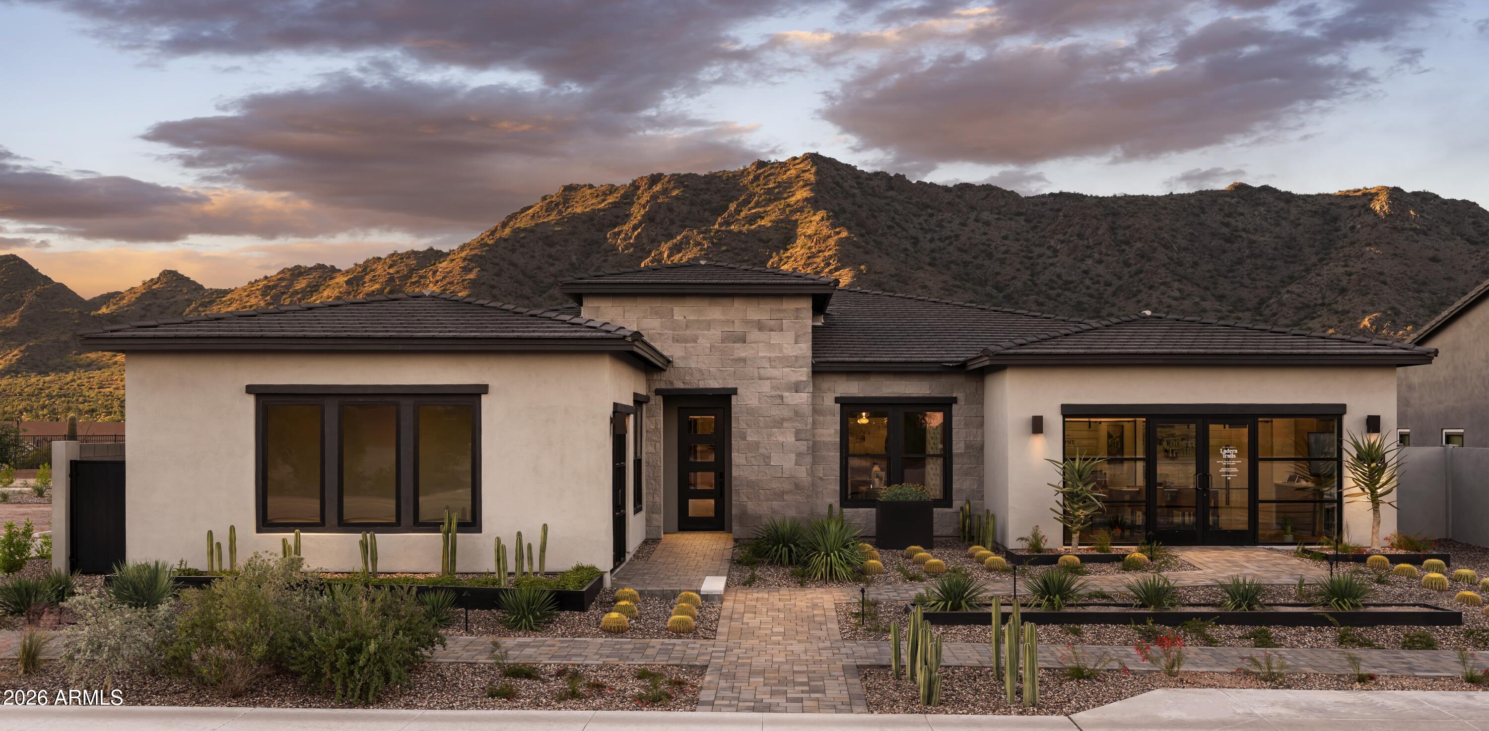 Leaseback opportunity!!  Own this stunning model home featuring nearly 3,700 square feet of thoughtfully designed living space, 4 bedrooms, and 4.5 bathrooms. Showcasing breathtaking mountain views and an extensive collection of luxury upgrades, this home offers the perfect blend of elegance and comfort. The open-concept layout features spacious living and entertaining areas, a gourmet kitchen, designer finishes, and premium details throughout. As a professionally decorated model home, it includes high-end enhancements and custom features that elevate every space. A rare opportunity to enjoy luxury living in a showcase residence with exceptional style, comfort, and views.  Buyer understands that this is a leaseback opportunity with the seller.