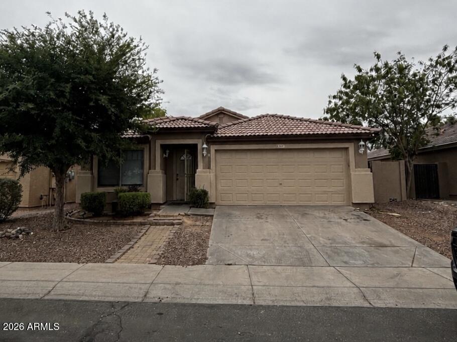 Lowest-priced 4-bedroom, 3-bath home over 1,800 sq ft currently available in the area, offering exceptional value in a prime Laveen location near Downtown Phoenix, shopping, dining, and everyday conveniences. This well-maintained home features bamboo flooring in the main living areas, wood-look flooring in the bedrooms, tile in the kitchen, and a spacious kitchen island perfect for daily living. The primary suite includes dual sinks, while the extended brick paver patio creates the perfect backyard space for relaxing or entertaining. Size, value, and location all in one.