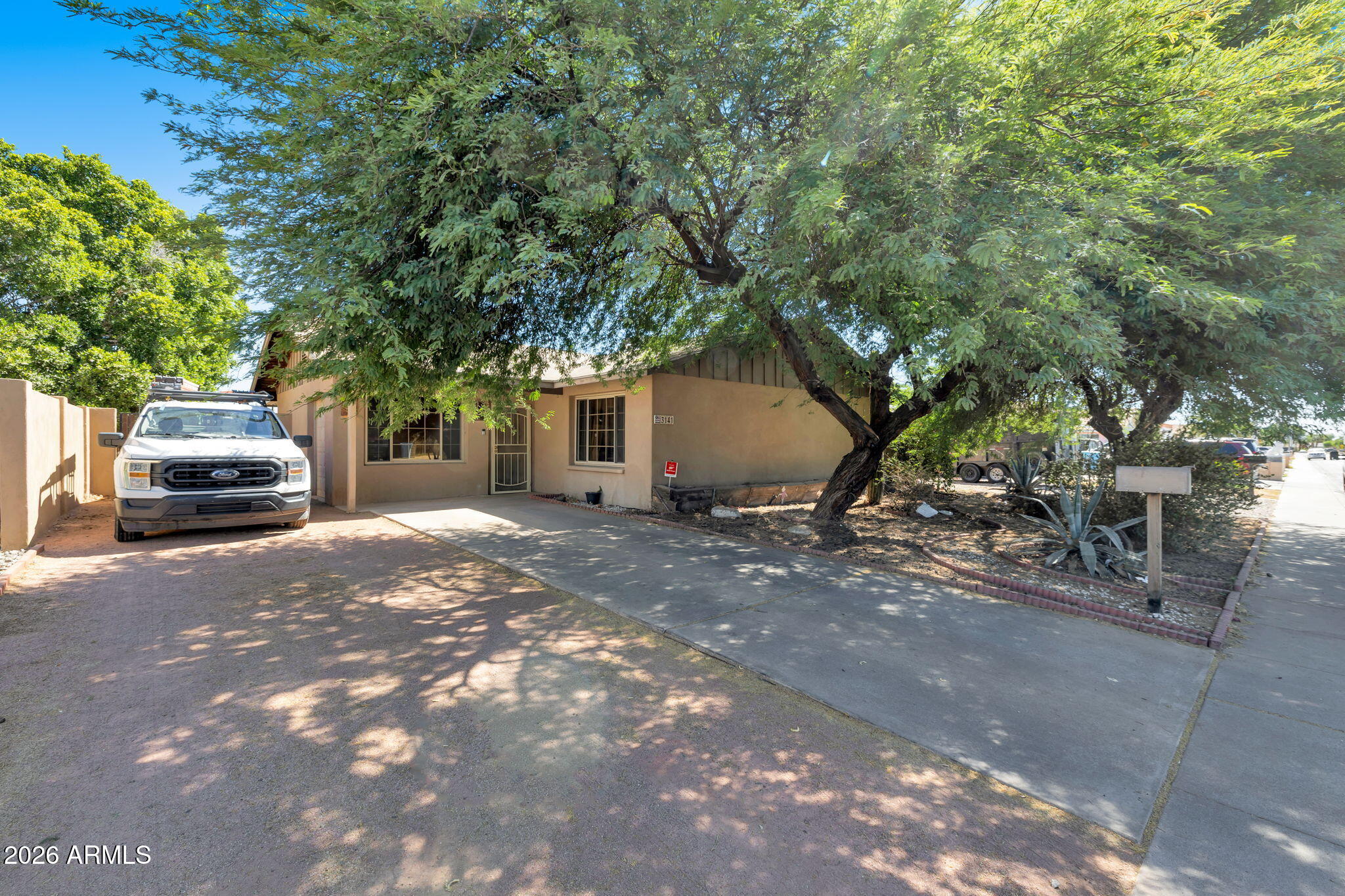 Welcome home to this well-maintained Phoenix property offering comfort, convenience, and great outdoor living. The spacious kitchen features granite countertops, ample cabinetry, modern appliances, and a large dining area perfect for gathering with family and friends. The primary suite provides direct access to the backyard, where you'll find a heated pool and generous covered patio ideal for relaxing or entertaining. An enclosed garage space, oversized RV gate, and plenty of additional parking provide flexibility for vehicles, recreational toys, or storage. Conveniently located near parks, schools, shopping, dining, and freeway access, this home offers an excellent opportunity in a desirable Phoenix location.