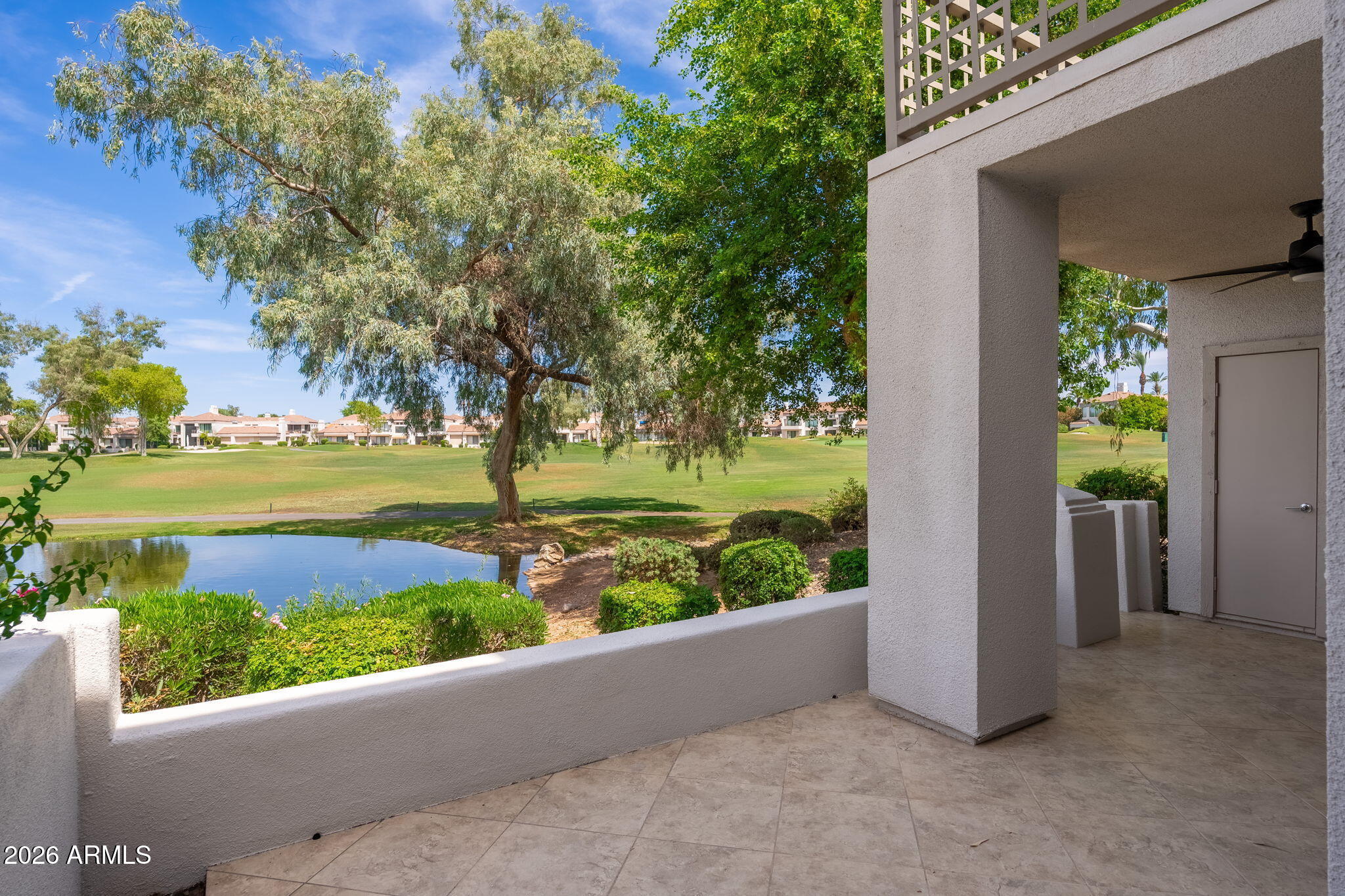 Experience resort-style living in this beautifully updated townhome, perfectly positioned in one of Gainey Ranch's most desirable locations. The open-concept floor plan is filled with natural light, thanks to expansive windows that frame the stunning golf course, lake, and mountain views throughout the home. Step outside to your private patio and enjoy sweeping fairway vistas, creating the perfect setting for relaxing or entertaining.
The thoughtfully redesigned kitchen features quartz countertops, custom designer cabinetry, premium finishes, and breakfast nook. Gorgeous 24-inch porcelain tile flooring featured throughout the main living areas, creating a sophisticated and seamless feel. Upstairs, you'll find two luxurious primary suites. The primary bedroom offers a spa-inspired bath with custom cabinetry, quartz counters, a freestanding soaking tub, and a walk-in shower, along with a private balcony perfect for enjoying morning sunrises. The second suite features a walk-in closet and updated bath. 
A versatile loft area between the suites provides the perfect space for a home office, den, reading room, or fitness area. Additional highlights include a spacious laundry room and direct access from the attached two-car garage along with a powder bath on the first floor. Ideally situated within the community, residents enjoy a short walk to the pool and spa, the Grand Hyatt Scottsdale Resort, world-class dining, shopping, and walking paths. Gainey Ranch offers an exceptional lifestyle with 24-hour guard-gated security, a private clubhouse, fitness center, tennis and pickleball courts, and an array of exclusive resident amenities.
Move-in ready and impeccably updated, this is a rare opportunity to own a lock-and-leave on the golf course luxury retreat in the heart of Scottsdale.