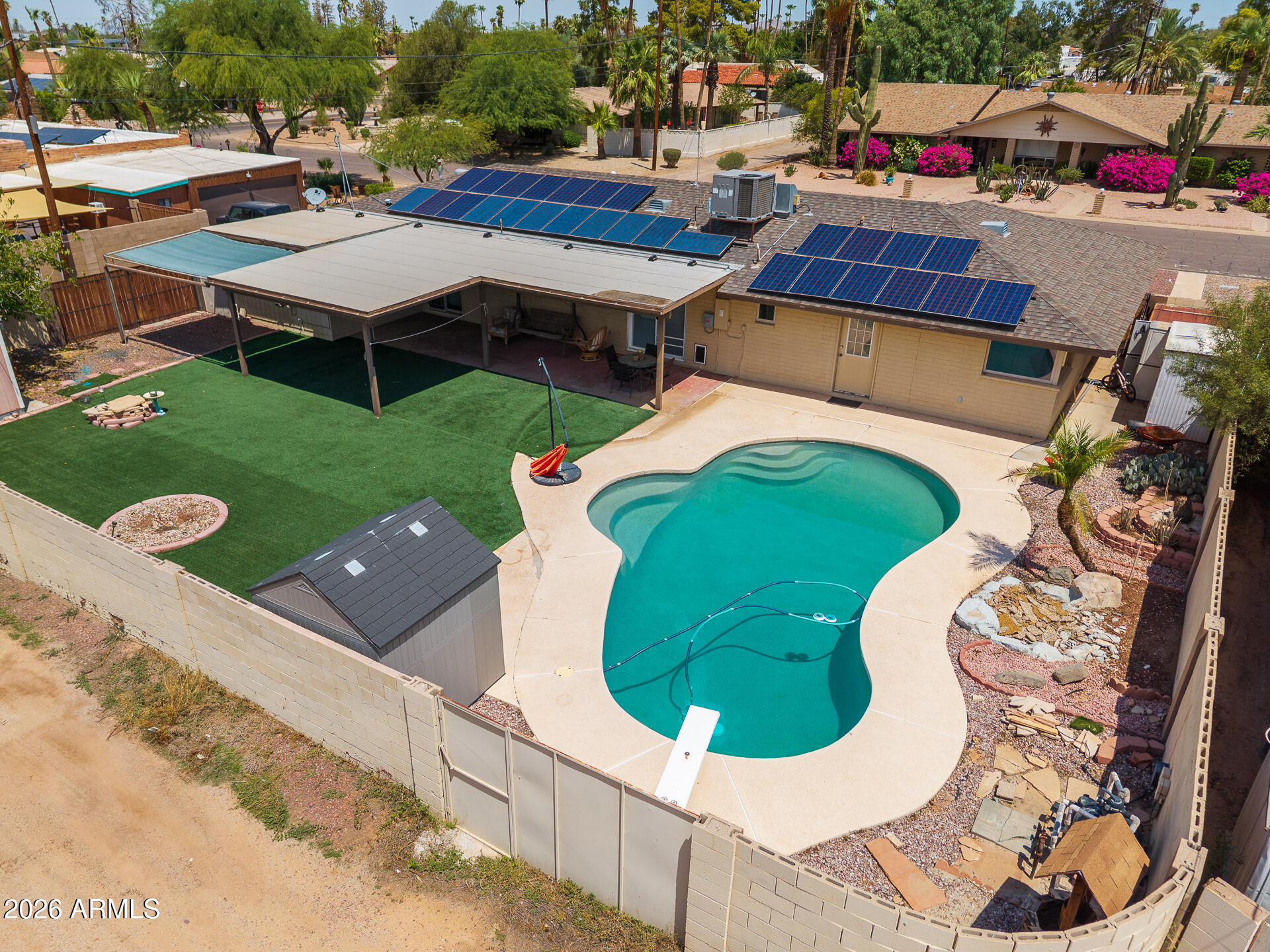 Welcome to your private backyard oasis! This exceptional 3-bedroom, 2-bath home is located in a highly desirable neighborhood with NO HOA. Well maintained and thoughtfully upgraded, this home features a spacious living room, formal dining area, and a beautiful eat-in kitchen with granite countertops. The oversized primary suite offers abundant closet space, a sitting area, and a private exterior door leading directly to the sparkling pool, and large covered patio, perfect for entertaining. Enjoy the beautifully landscaped backyard with turf, a powered shed, and plenty of space to relax. Additional upgrades include a solar system and a new floor purchase ready for installation. This home offers comfort, style, and pride of ownership.900 sq ft  of new Luxury Vinyl Plank conveys.