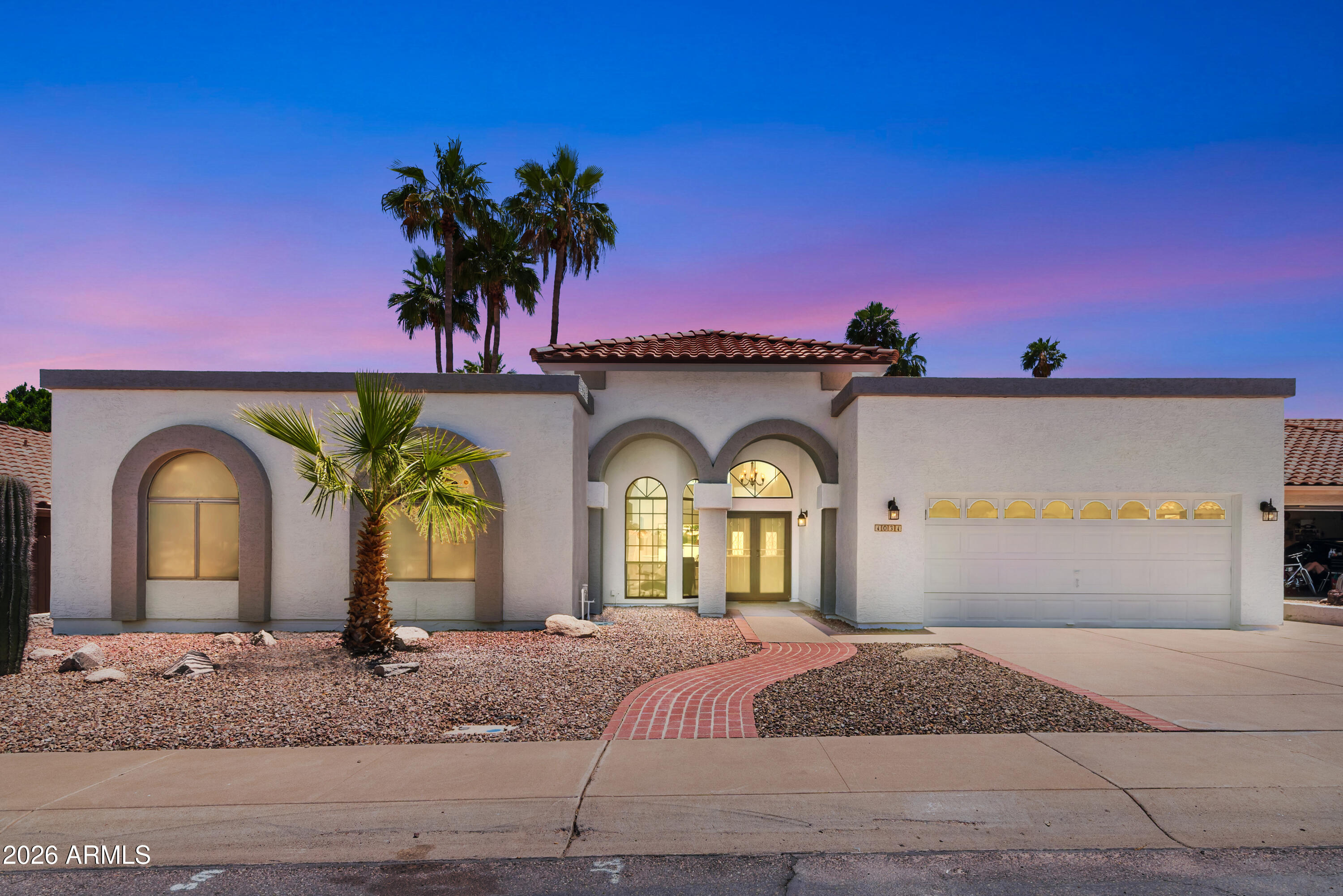 Beautiful single-level 4-bed, 2.5-bath home on a premium oversized lot in The Islands, one of Gilbert's most sought-after lake communities. Upon entering, you'll notice expansive ceilings and abundant natural light. The functional floor plan features a flex room, formal dining area, and large family room perfect for entertaining. Recent updates include int/ext paint (2026), tile roof (2025), water heater (2024), AC units, foam roof, and turf (2021). The spacious kitchen offers an island, dining area, and ample storage. Relax in the primary suite with a soaking tub, separate shower, and two walk-in closets. Enjoy a resort-style backyard with a pool, oversized covered patio, and turf. The Islands offers lakes, paths, parks, and community events, all just minutes from Gilbert's best dining