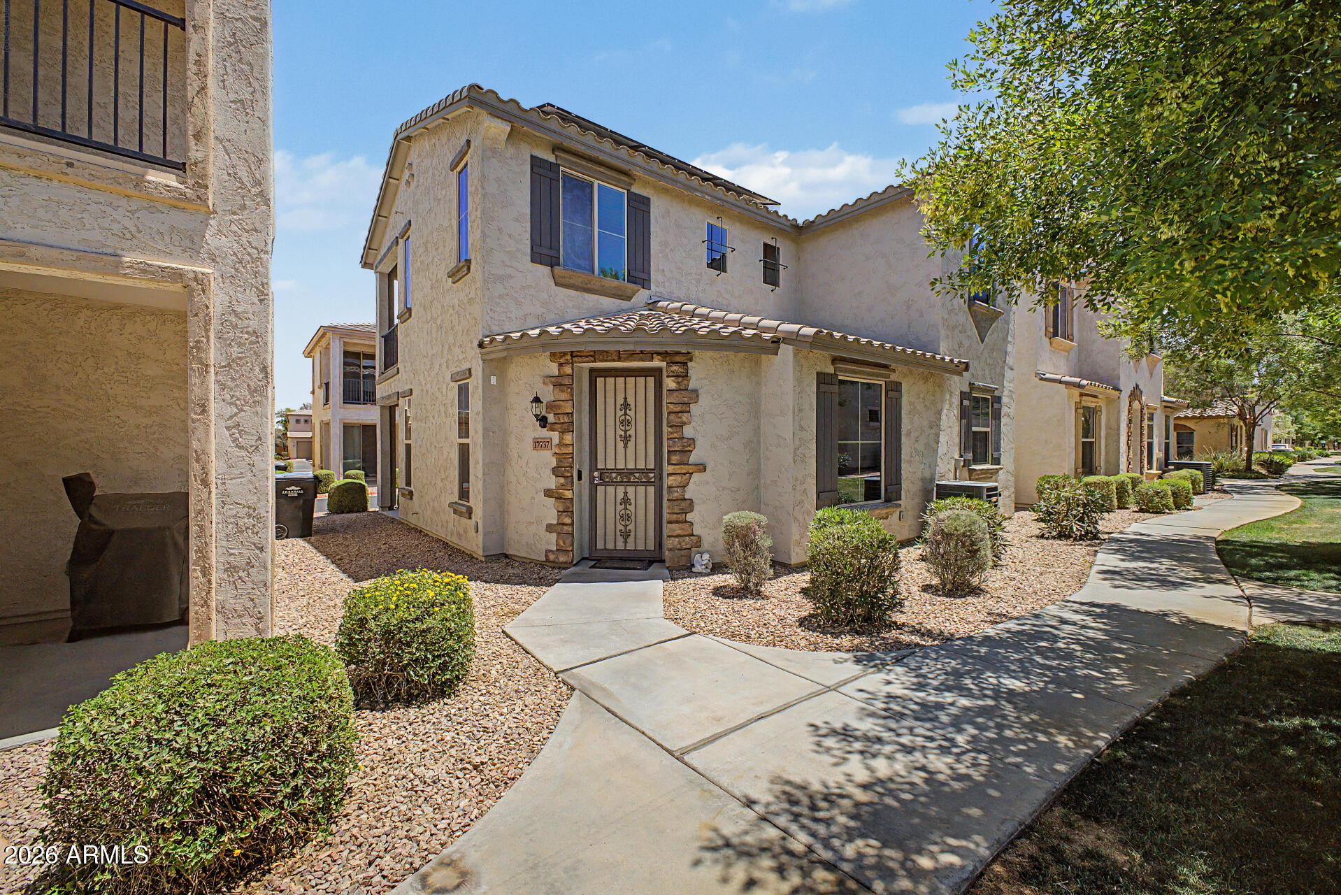 This beautifully updated home in the highly sought-after Sierra Montana community features fully OWNED solar panels and offers exceptional value and comfort. Inside, you're greeted by new interior paint with a cozy living area that flows effortlessly to the covered patio, ideal for year-round enjoyment. The gourmet kitchen features gorgeous granite countertops, stainless steel appliances that convey, plenty of storage, and more. 
Upstairs you'll find a convenient laundry room with built-in storage and a new washer and dryer. The luxurious owner's suite is a true retreat, boasting double sinks, a spacious walk-in closet, and a private balcony. Additional highlights include a 2-car garage with epoxy floors, workbench, and extra storage.
Located in the desirable Sierra Montana neighborhood, conveniently close to excellent schools, shopping, dining, and provides quick access to the Loop 303 freeway. Truly turn-key and better than new -- welcome home!