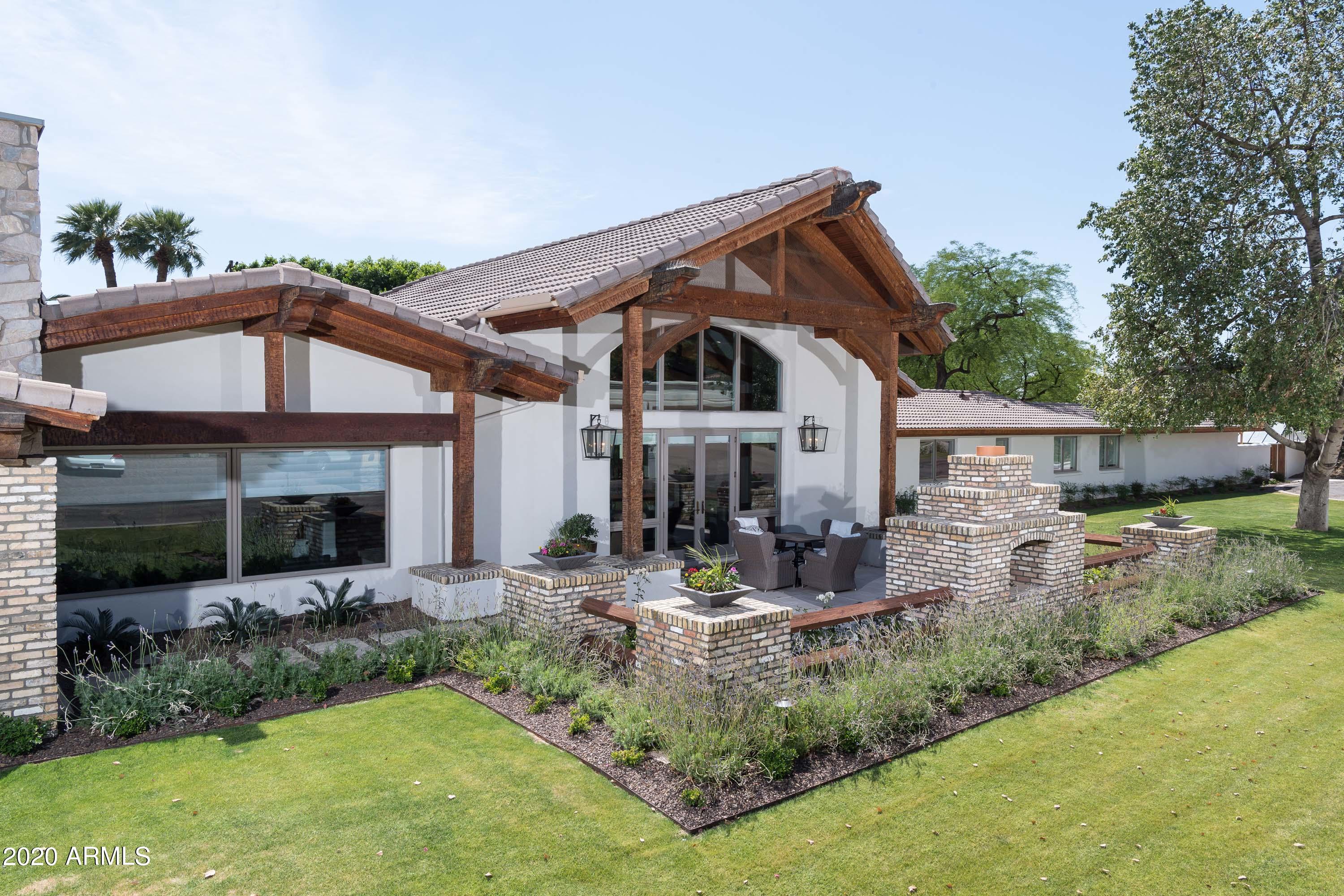 Enjoy this masterfully remodeled Arcadia Estate with spectacular Camelback Mountain views. Featuring 6 en suite bedrooms / large open great room with custom designed kitchen and state of the art appliances / butlers pantry / flex rooms / private court yards / 2017 pool crafted by Create Environment complete with limestone decking and surrounded by lush green landscape / green house and custom built garden boxes and more-designed to perfection.  There will be many hours enjoyed under the meticulously designed ramada complete with outdoor kitchen / Wolfe grill /state of the art mister and heating systems-all ideal for entertaining family and friends. Not a penny was spared and the thoughtful craftsmanship is notable throughout this special property.