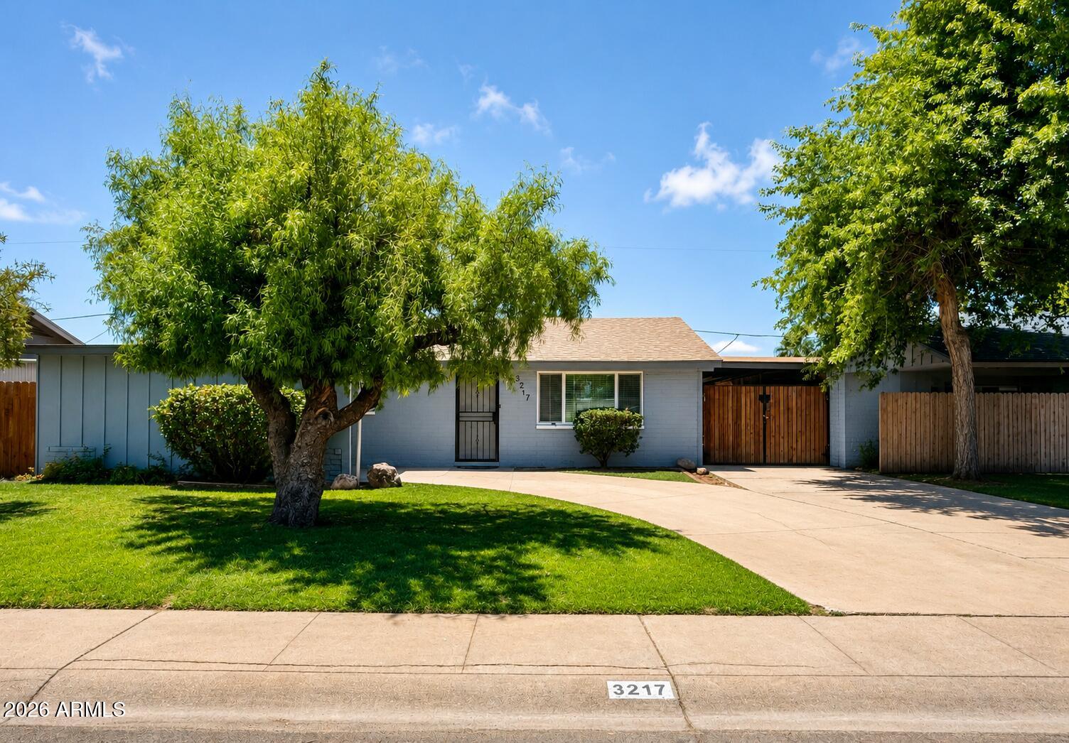 Some homes come to market. Others make an entrance. First time ever offered by the original owners, this updated North Phoenix home near 35th Avenue and Greenway is the kind of property buyers wait for -- and rarely find. Set directly across from a park, within walking distance to Desert Foothills Junior High, and with Acacia Middle School also nearby, this 3 bedroom, 2 bathroom home combines location, lifestyle, and true turn-key condition. Inside, the home feels fresh, modern, and move-in ready with soothing neutral gray paint, neutral tile flooring, new windows, refreshed bathrooms, updated vanities, and a beautifully tiled hall bath shower. The expanded kitchen is the heart of the home and an absolute standout with a HUGE island, granite countertops, stainless steel appliances, abundant storage, generous workspace, and even a prep sink. Just off the kitchen, the large laundry room adds the kind of practical function buyers love. Big-ticket updates are already handled with a new HVAC and newer roof. Outside, the backyard is ready for Arizona living with a sparkling pool, 2 sheds, and an impressive 9.5 x 13 workshop offering space for tools, hobbies, projects, or extra storage. This is not a project. This is the one where the work is done, the upgrades are in place, and the lifestyle is ready to enjoy. This is North Phoenix turn-key living at its best.