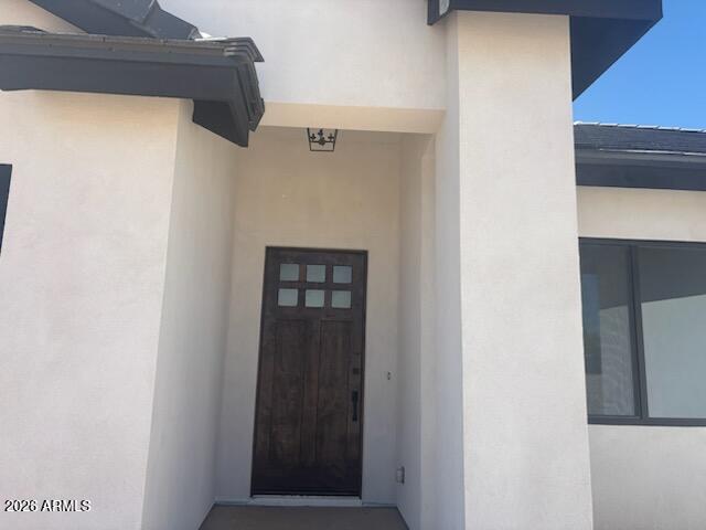 Beautiful four bedroom home with an oversized attached RV garage (46') . Oversized 2 car also must see to believe!!
Split bedrooms,  Master Bedroom has a Master closet with a Classy Closet install ,all kinds of storage. Double sinks with a stand alone soaking tub , a beautiful tile job in both master and hall Showers.  Master has a middle rain head and two more shower heads.  The great room flows into the kitchen with a LARGE island with lots of upgraded cabinets .  The  view out of the great room with four glass doors that can all open to have a  vintage look at Sonoran desert, coupled with a priceless view at a zero edge pool that will be looking like it flows into a natural wash. Plenty of room to build Horse pens/ Shop in the back  of the 1.25 acre  lot