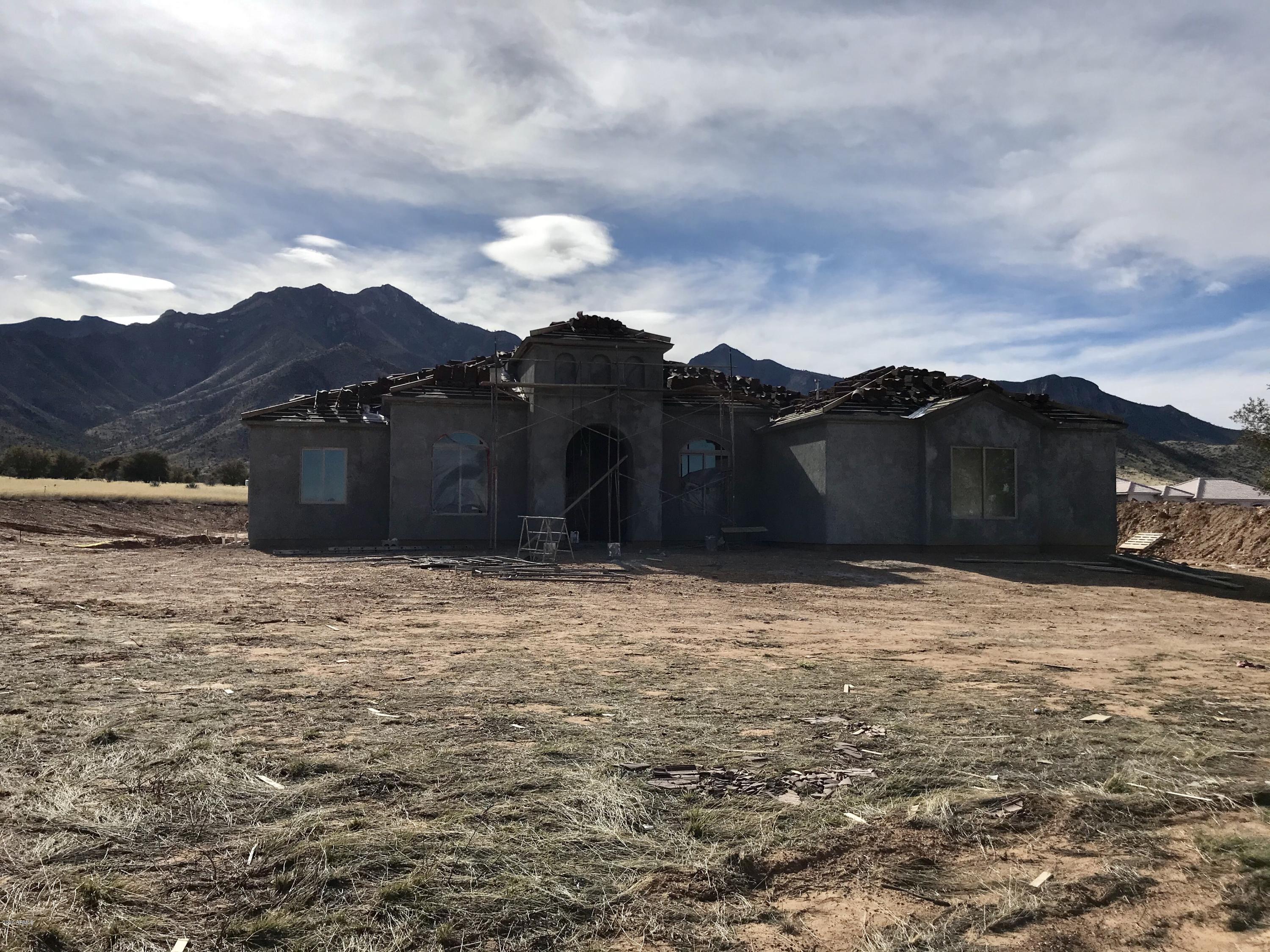 Custom home built by Stronghold Construction providing uninterrupted mountain views on corner lot in serene Wildhorse subdivision. This home features 4 bedrooms and 3 bathrooms split floorpan in approx 3100 sqft of open concept living.
