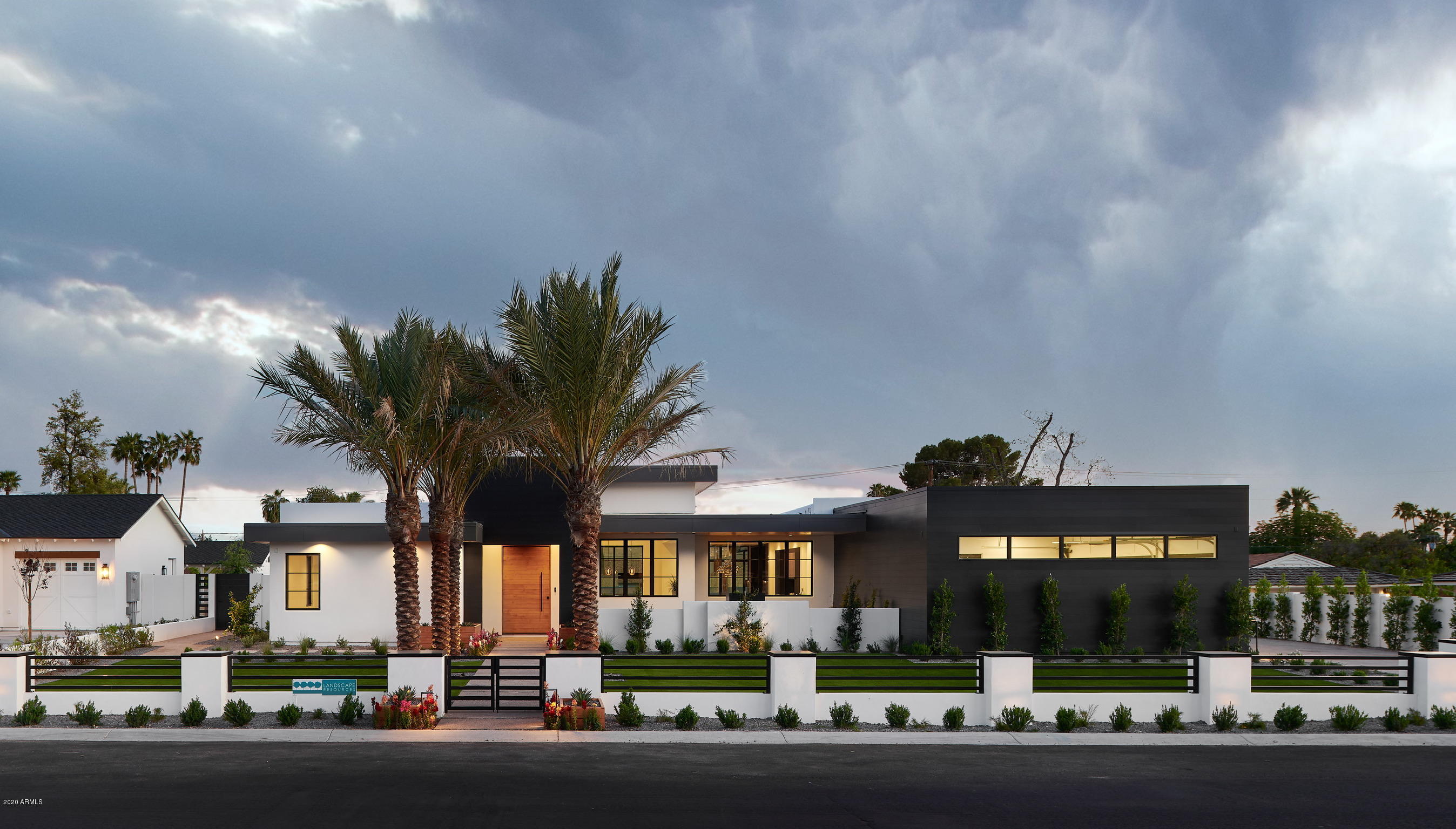 You won't find anything comparable to this iconic, modern build from Two Hawks Design & Development! Sleek lines and contemporary finishes boldy challenge the aesthetic in this sought-after neighborhood. Finely appointed with bespoke details at every turn, this new home is elegant, uncomplicated, and evokes a sense of warmth unfound in contemporary homes. With coveted Camelback Mountain views from both the front and back yards, and multiple large entertaining areas, this chic residence is sure to inspire and amaze. A sparkling negative edge pool, sport court, and generous outdoor living space complete this impressive home that will delight family and friends.