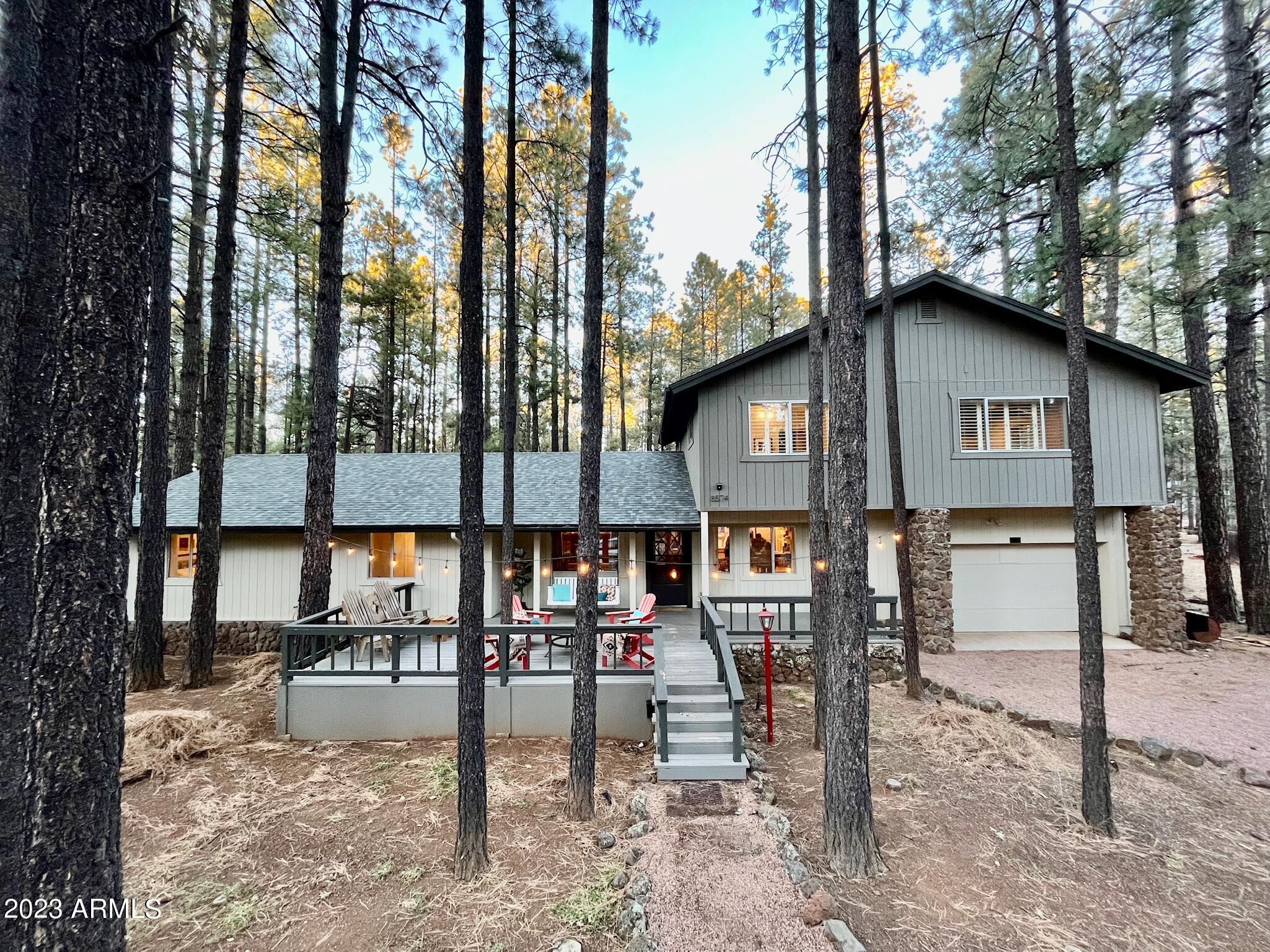 Stop your search- this is the home you've been looking for!! There is nothing this size in this area like it!! Truly turn key. 5 bedrooms plus a loft leaves space for everyone to sleep comfortably and also have their own space. All furniture is included in the sale. This home is nestled near the forest where the smell of Ponderosa pines and the cooler temperatures make you never want to leave. Primary bedroom on the main floor. Two additional bedrooms on main level. Upstairs find two more bedrooms and a loft/game area for an additional entertaining space. The patio has been added onto so you have plenty of space to swing on the front porch or just enjoy listening to the wind whip through the trees, This home is close to restaurants and all that Pinetop has to offer. Come see it today!