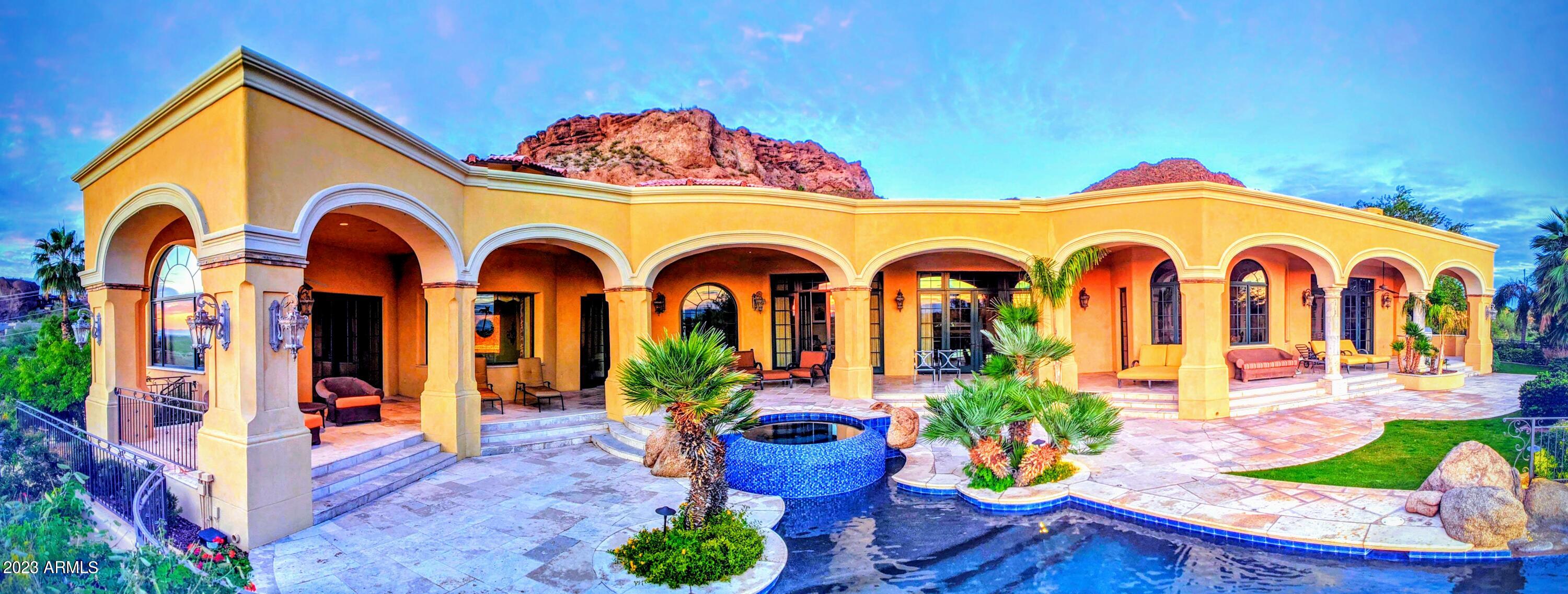 TurnKey ARCADIA on CAMELBACK MOUNTAIN, ONE-LEVEL- 1.18 ACRE VERY PRIVATELY Gated Lot w Separate-Detached GUEST HOUSE! all Ensuite Living Custom built SANTA BARBARA/Tuscan estate overlooking all ARCADIA w a GRAND-EXPOSURE to Horizon-Wide UNOBSTRUCTED VIEWS -CITY LIGHTS SUNRISES+ SUNSETS the Far East to West Horizons of the entire Valley • High 15' sweeping ceilings 9'+doorways, Carved Walnut & Italian Travertine & Venetian Plaster - LARGE OPEN TERRACES & Deep Covered Shaded Patios w built-in high-pressure misting & NETWORKED systems for entertaining indoors & out! Grass Lawns for Fido, Office, Theater, Bottle Cellar Fireplaces GRAND Gourmet Kitchen & ISLAND, Gas Fireplaces, (-)Edge Bottle shaped Pool Waterfall Spa + Mini-Golf Green CIRCLE-DRIVE 3 Car Garage No HOA & Sewer In+Connecte