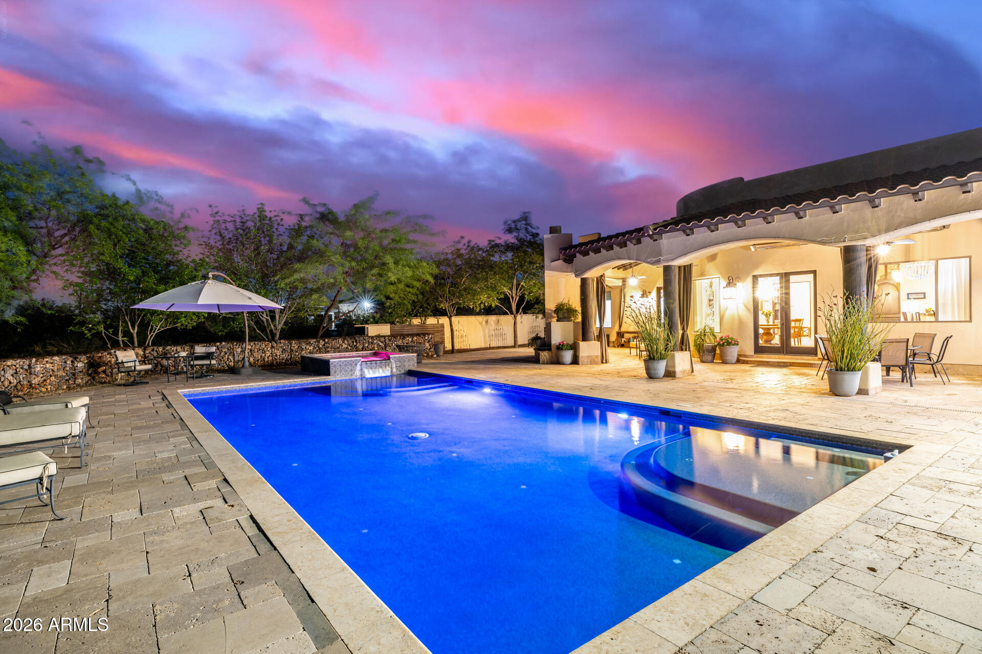 Ready to move and impossible to replicate, this is the Scottsdale lifestyle at its finest.
Set on 10 ACRES in the heart of coveted horse country, this beautifully updated estate offers a rare blend of luxury, privacy, and limitless potential.  Step outside and experience what truly sets this property apart--an extraordinary backyard designed for year-round enjoyment. Take in unobstructed views of Four Peaks from your heated pool and spa, unwind by the two-sided fireplace, or host unforgettable evenings with a built-in grill and wall-mounted propane heaters. Every detail, from the custom fencing to the curated landscaping, creates a setting that feels like your own private resort. Whether you're envisioning a premier equestrian operation or simply craving room to breathe, the acreage delivers on every front. A massive shop adds an exceptional layer of versatility -- purpose-built for serious storage, equipment, or whatever your lifestyle calls for. Beneath it all, a high-output private well supported by two 10,000-gallon storage tanks ensures the kind of reliable water infrastructure that ranches of this caliber demand.

Rarely does a property combine this level of turnkey luxury with the flexibility to create your own equestrian legacy. Whether you are seeking a quiet escape or a world-class horse property, this exceptional estate is truly in a class of its own.