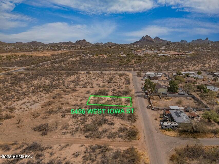 This property consists of five separate parcels which can be sold individually or as a package. The land is perfect for creating a residential community. Zoned CR3 (small site-built homes) and CB2, each lot ranges from 7,300 to 7,550 square feet. Water service is available, though it runs along Sheridan and Sunset. Developers will need to cover the cost of extending water pipes from Iowa and installing meters. Excellent development opportunity!