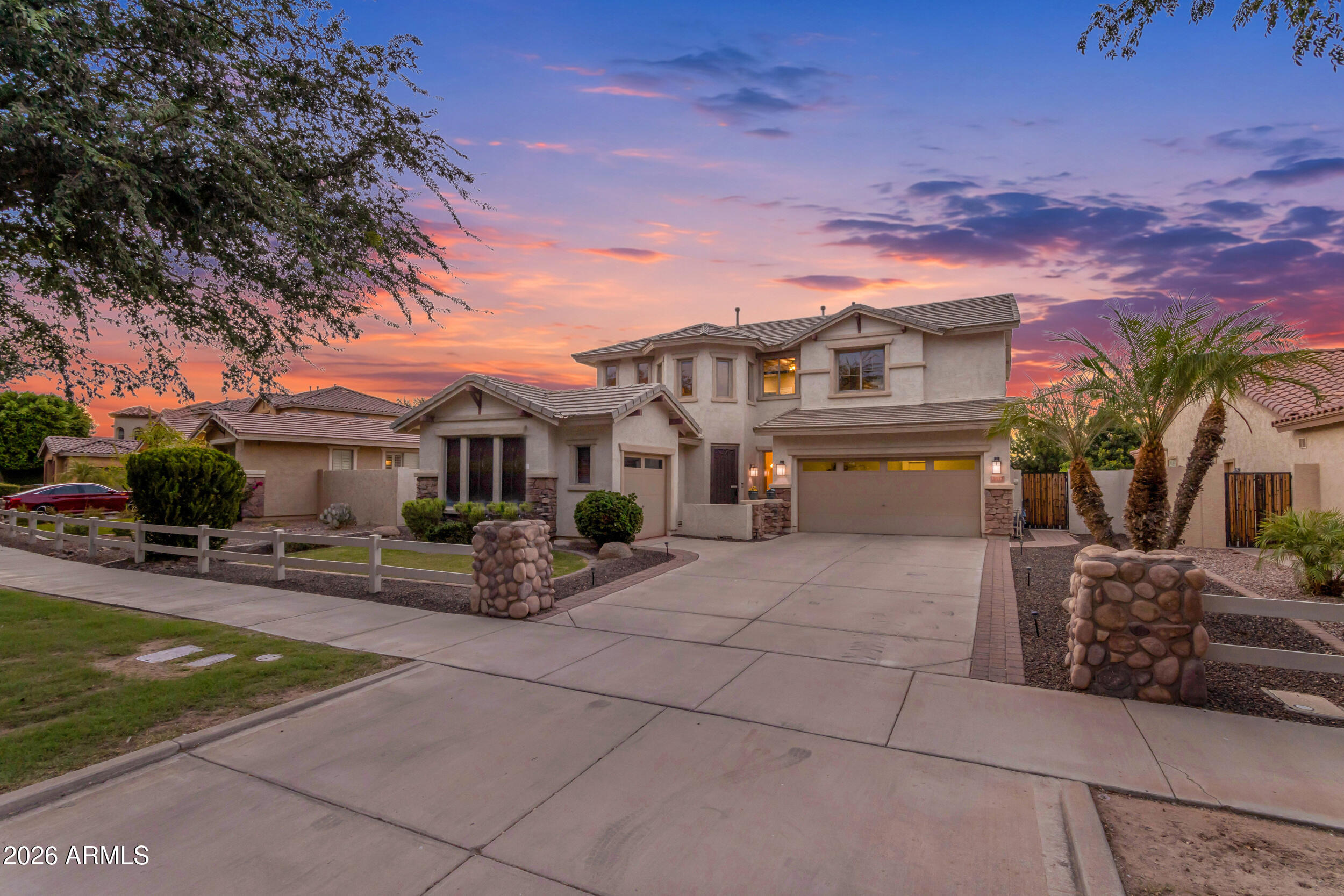 Welcome to Old Stone Ranch, one of Chandler's most distinctive and desirable communities, where scenic lakes, tree lined streets, charming white picket fences, neighborhood parks, and walking paths create a setting that feels both welcoming and connected. Conveniently located within the Chandler Unified School District, with Arizona College Prep serving as the boundary high school, this home offers an exceptional combination of location, community, and everyday convenience. This spacious 2766sqft home offers 4 bedrooms, 3 full bathrooms, and a highly functional floor plan designed to adapt to the way you live. A downstairs bedroom and full bathroom provide the perfect setup for guests, multigenerational living, or a private home office, while multiple living and dining spaces offer flexibility for both everyday life and entertaining. At the heart of the home, the kitchen features granite countertops, stainless steel appliances, abundant cabinetry, a center island, and breakfast bar seating, all opening to the surrounding living spaces where family and friends naturally gather. Upstairs, a generous loft creates additional room for a media space, game room, homework station, or lounge area. Just beyond the loft, a charming bonus room offers endless possibilities as a playroom, reading nook, craft space, or private office tucked away from the rest of the home. The spacious primary suite provides a peaceful retreat with a walk-in closet and ensuite bath featuring dual vanities, a soaking tub, and separate shower. Two additional bedrooms and a full bathroom complete the second level. Step outside and discover your own backyard escape. Whether you're cooling off in the sparkling pool, enjoying dinner beneath the covered patio, or simply relaxing after a long day, this outdoor space was designed to be enjoyed year-round. Complete with a desirable 3-car garage and located in one of Chandler's most sought-after neighborhoods, this home offers the space, flexibility, and lifestyle today's buyers are looking for.