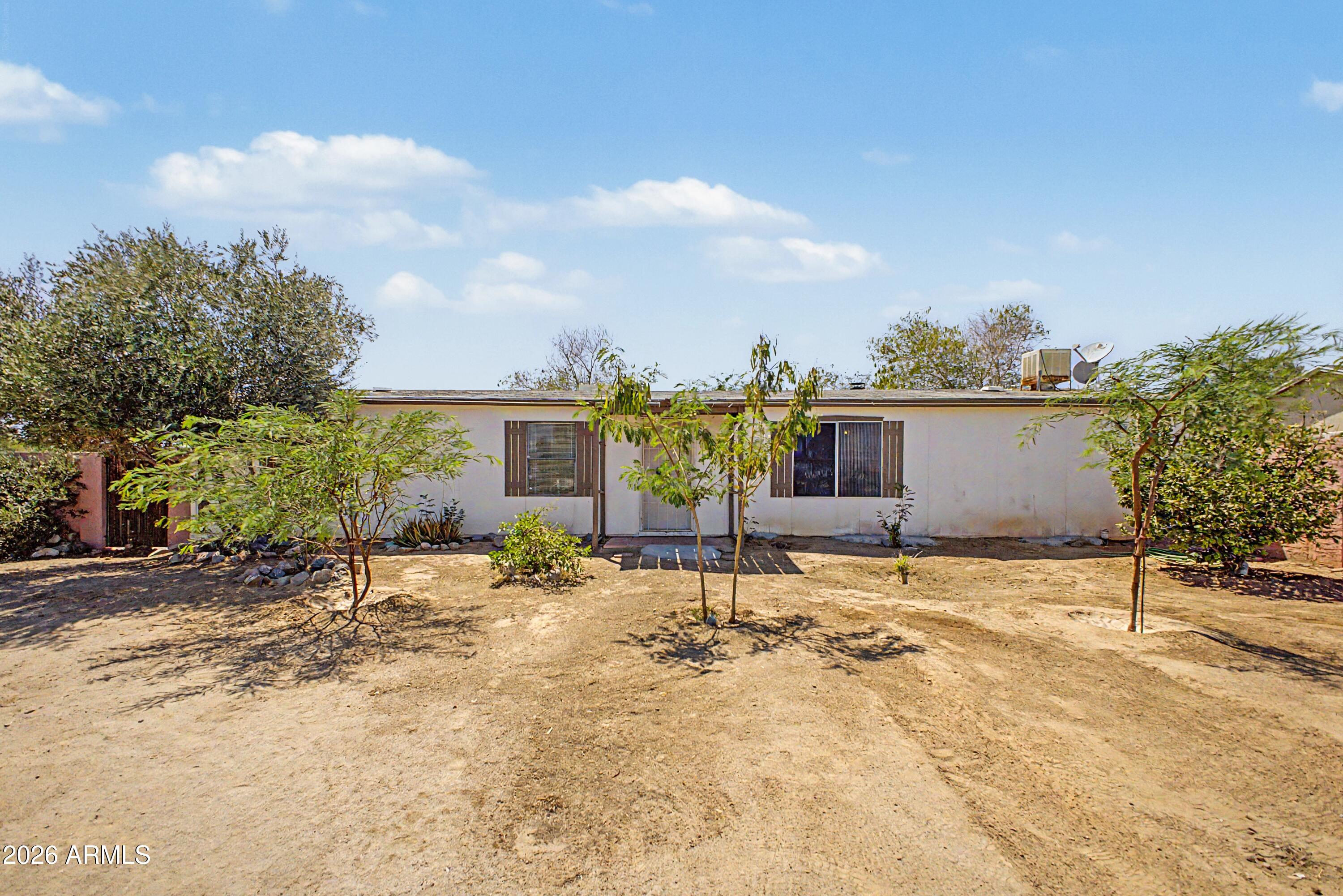Great starter home, 4 bedroom 2 bath located near freeways. This property has the fourth bedroom separate from the rest of the house. property also has two RV gates.