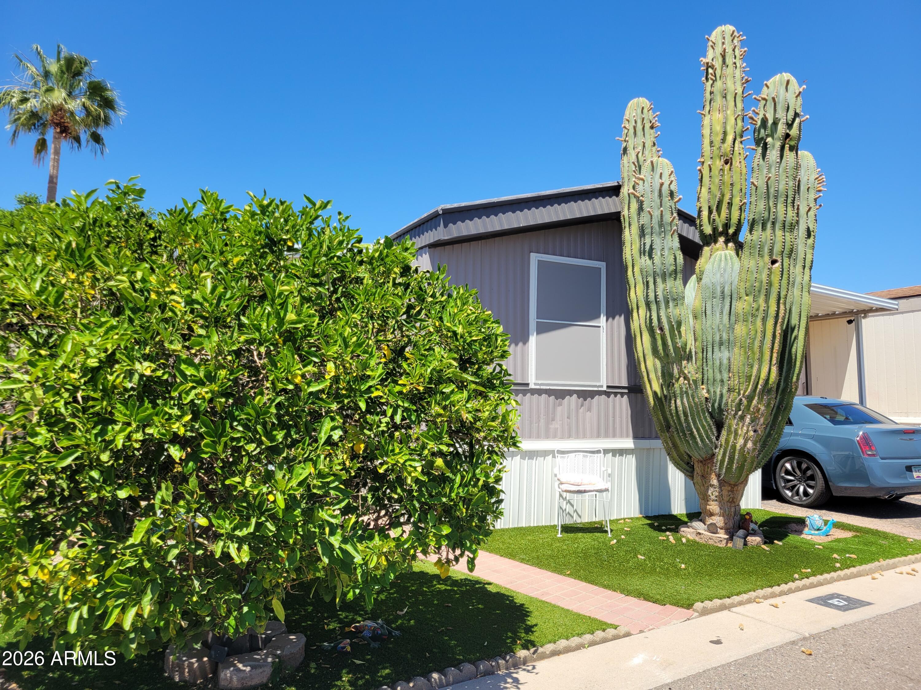 Beautifully upgraded3 bedroom home, with cozy backyard oasis, in the all ages community of Windsong! Enjoy all of the beautiful upgrades the current owner has made, including: new floors, upgraded bathrooms, new plumbing in the kitchen, remodeled kitchen, new countertops, new lights, new awnings, new skirting and an AC unit that is only 4 years old! Enjoy the community pool in the warmer summer months, and nearby hiking trails!!