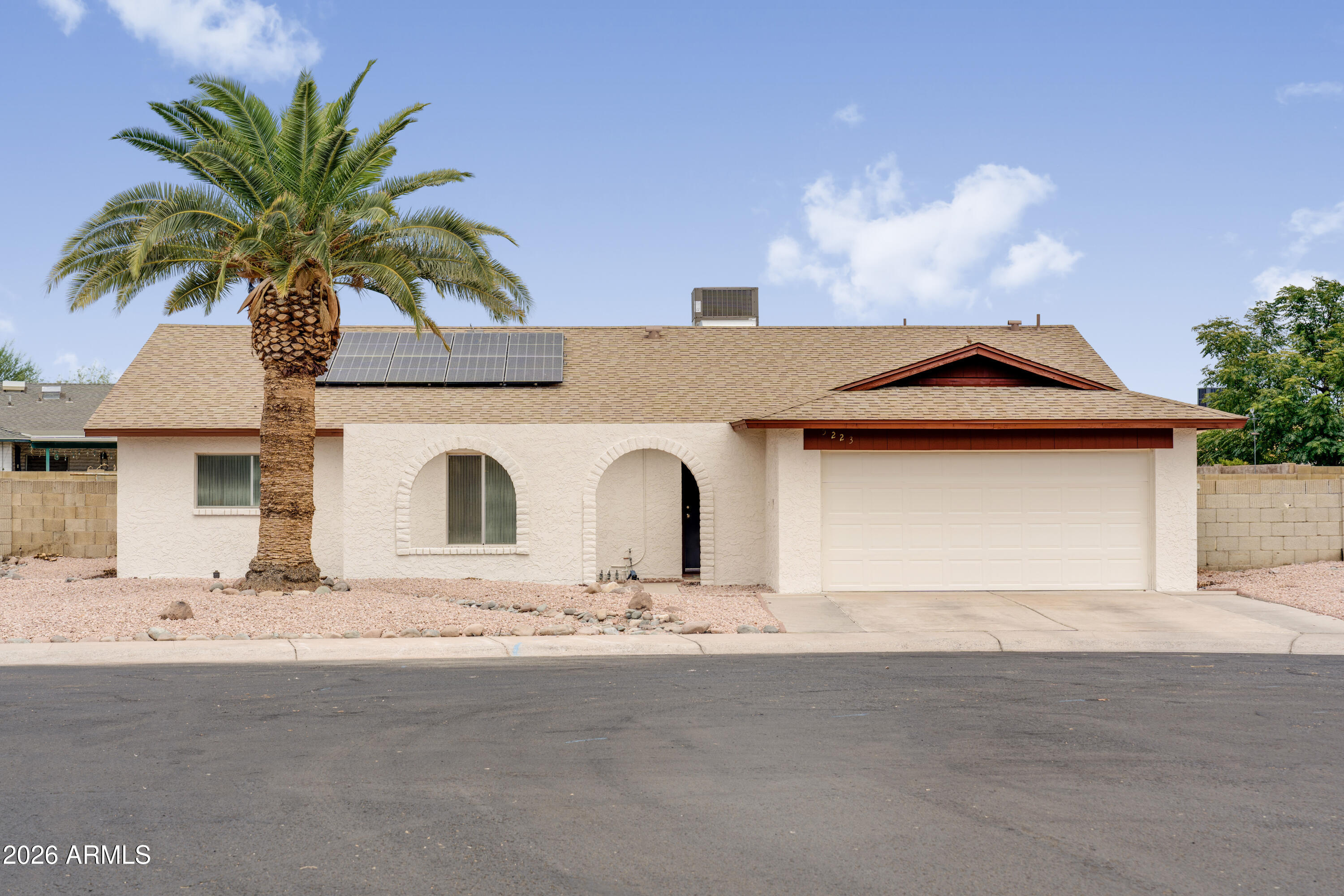 Spacious single-level home on an oversized 10,000+ sq ft cul-de-sac lot with no HOA! This 3-bedroom, 2-bath home offers 1,876 sq ft of comfortable living space, featuring a formal step-down living room, cozy family room with wood-burning fireplace, and an open dining area ideal for everyday living and entertaining. 

The galley kitchen includes an additional dining space, oversized pantry, and abundant cabinet storage. A large laundry room with storage closet provides added functionality.

Step outside to enjoy Arizona living with a covered patio, low-maintenance turf, and a sparkling diving pool with newer pool pump. Major improvements include fresh exterior paint, a new roof and HVAC system installed in 2026, water heater replaced in 2021, updated lighting and plumbing fixtures, wood laminate flooring, and leased solar panels designed to help offset energy costs. Solar lease to be assumed by buyer. New HVAC and roof include transferrable warranties.

Conveniently located near Loop 101 and I-17, offering easy access to shopping, dining, entertainment, and commuting throughout the Valley. Combining generous indoor living space, a large lot, valuable system updates, and no HOA, this Glendale home is ready for its next owner.

Listing agent is related to seller.