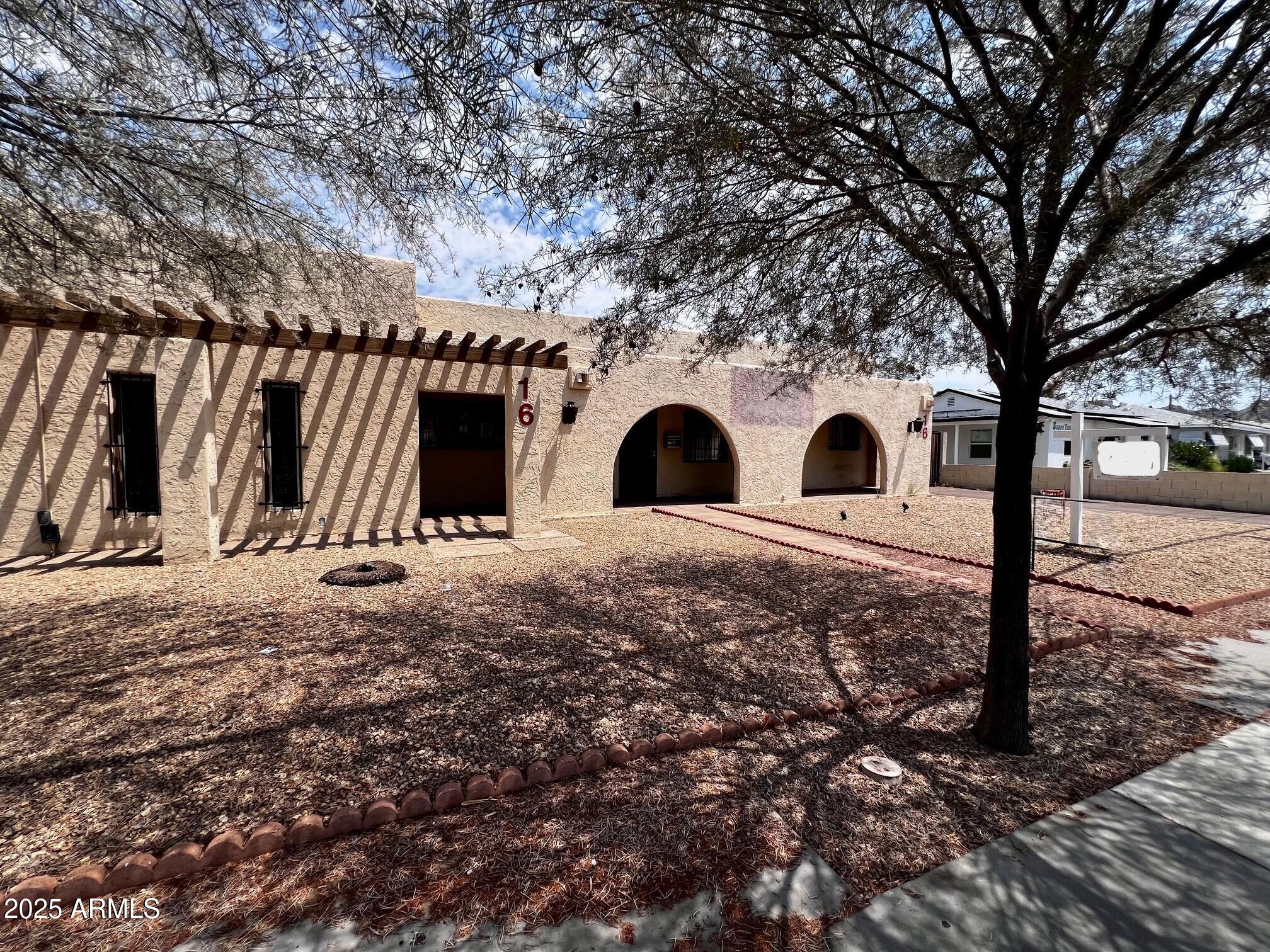 OWNER MAY CARRY! Zoned C-2 multi-use, part of Hatcher Overlay District (see docs) on lrg lot in N. Central Phx, good street frontage. Currently set as 2 sep office suites, ea with reception area, 3 offices and 1 bath. SUITE A has kitchenette and appx 740sf, SUITE B apppx 830sf. Or c/b be used as one lrg 6-office suite with 2 bathrooms (no shower/tub). C/B prof office, medical clinic, beauty salon, construction bldg. Out bldg w/elect for addl storage or office. Travertine floors with carpet in offices. LARGE LOT with rear yard secured by block fence. 2 RV gates for access, great for equip/vehicle storage. Lots of parking in back. 1 AC replaced appx 2 yrs ago. Paved walkway & front patio. Near John C Lincoln Med and EZ access to downtown Phx & 51 Fwy. Great rental potential! OWNER MAY CARRY.