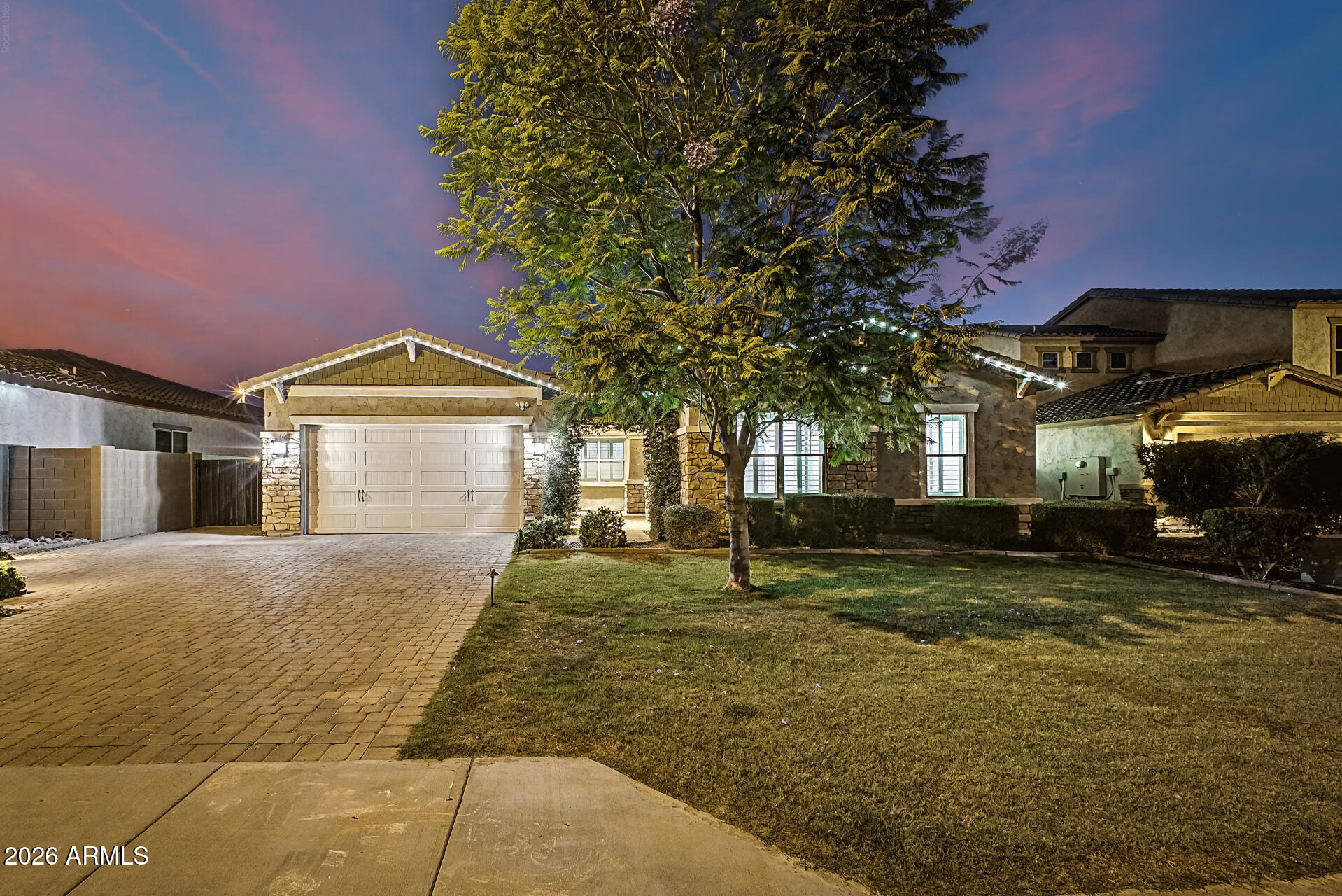 Welcome to highly sought-after The Bridges North and this beautifully upgraded home with exceptional curb appeal from the moment you arrive! Offering 2,626 sq ft of luxury living, this popular Meritage Homes floorplan features an expansive open-concept design perfect for entertaining and everyday living. Recently remodeled with luxury vinyl plank flooring, fresh interior paint, new Berber carpet in all bedrooms, and designer finishes throughout. The stunning kitchen showcases new cabinetry, quartz countertops, premium Café appliances, plus an added beverage center with integrated under-counter microwave. Additional custom touches include a formal dining beverage center and impressive great room entertainment wall. Step outside to an entertainer's dream backyard complete with a sparkling saltwater pool, upgraded pool equipment, new turf, built-in BBQ, generous counter space, and overhead party lighting. Beautifully landscaped front and back. Enjoy all that Bridges North has to offer including parks, lakes, splash pads, bocce ball, playgrounds and more. This is Arizona living at its finest!