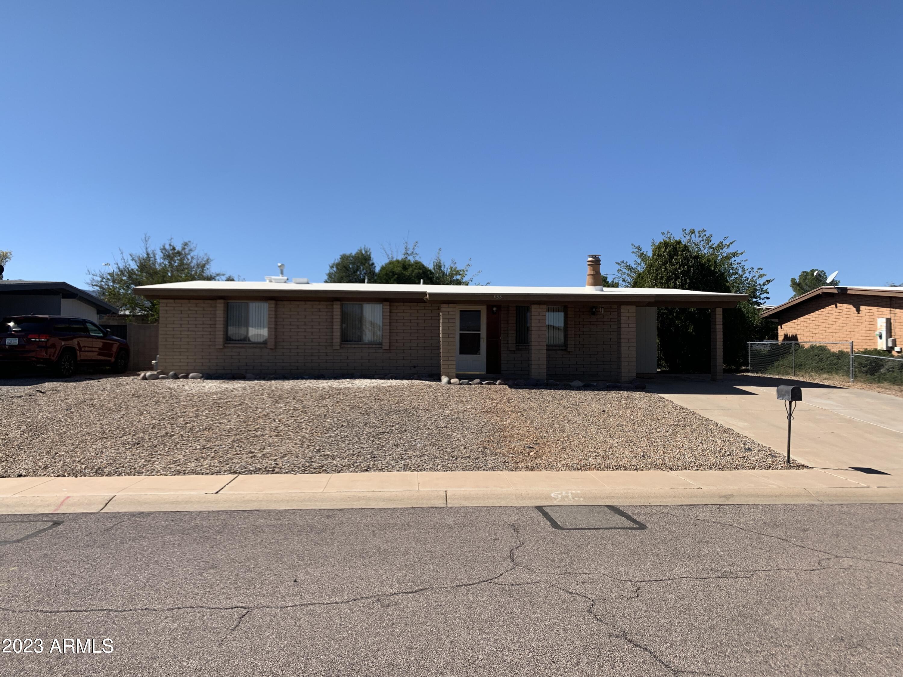This 3BD/2BA/1CP, 1184 sf rental home located in Sierra Vista, AZ is minutes from Fort Huachuca, shopping, and schools. This quaint home uses its square footage nicely, has a good family room to kitchen combination, a decorative fireplace (non-functional), a laundry room, low-maintenance front and back yards, and a big shed for storage area or workshop. The house is rent ready! Call today to schedule a time to come and see for yourself.