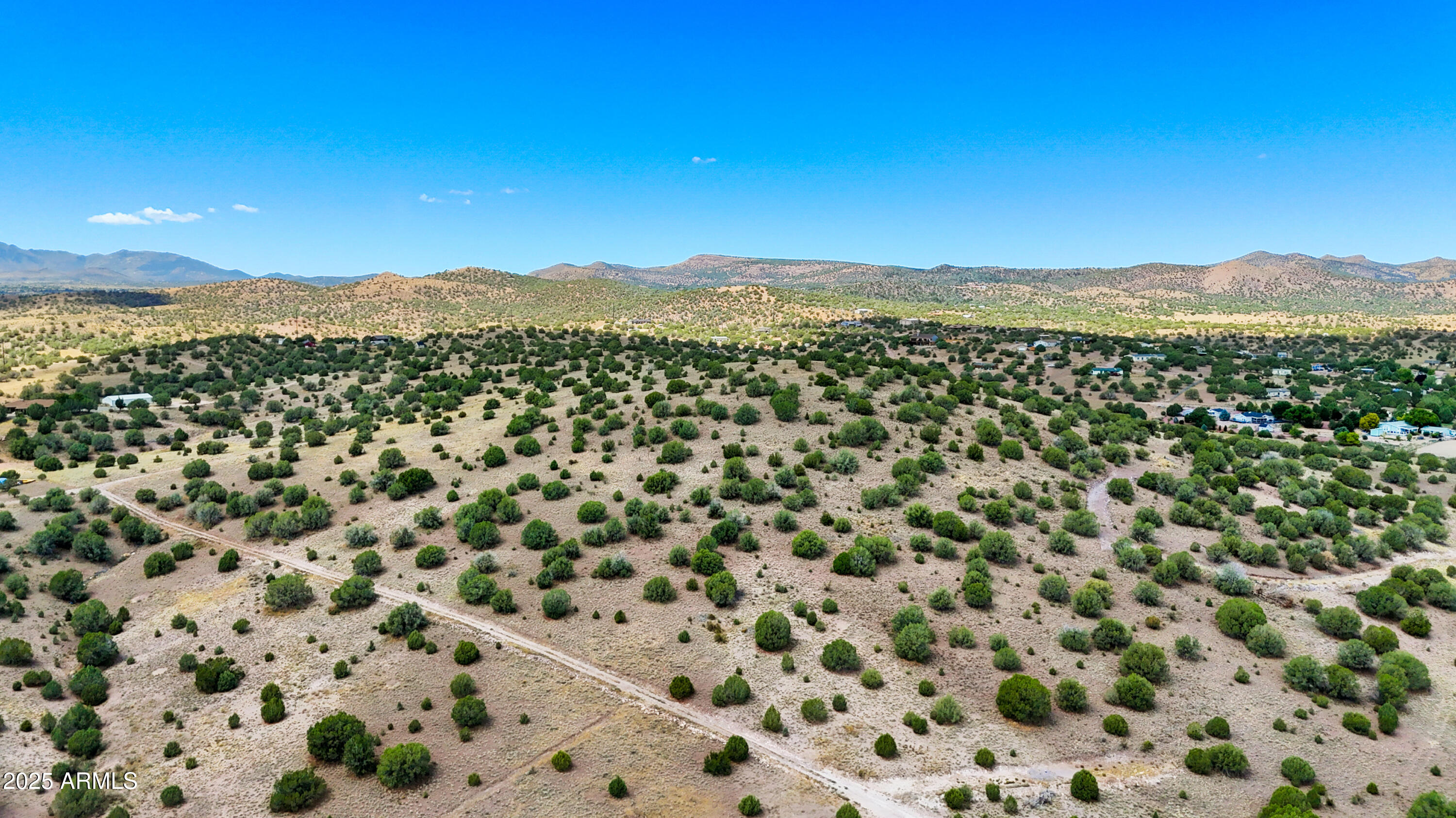 Embrace country living on this 2.12-acre parcel in Chino Valley, AZ. Enjoy plenty of usable space for your dream home, workshop, animals, or hobby farm, all set against sweeping mountain views and breathtaking sunsets. Just minutes from shopping, dining, and schools, this property blends rural tranquility with in-town convenience. Easy utility access and open land make it the perfect canvas for a private retreat or small ranch.