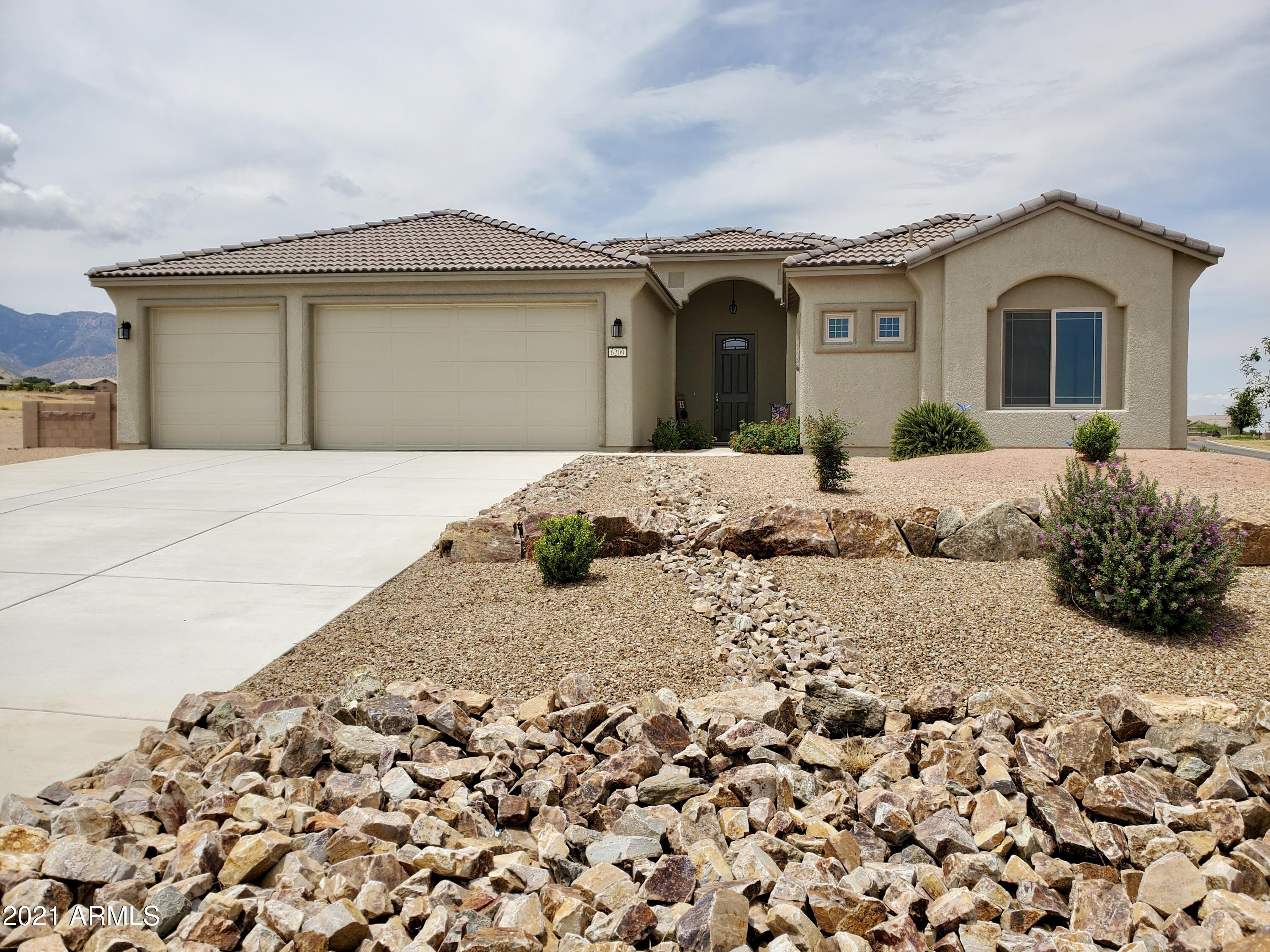 Brand New Construction Home, NEVER lived in.  Gorgeous 3 bedroom, 2 bathroom home with 3 car garage.  Stunning white kitchen with large island, split floor plan, wood look tile, large windows to take in the mountain views, upgraded block wall includes view panels.  No wait for a new construction home!