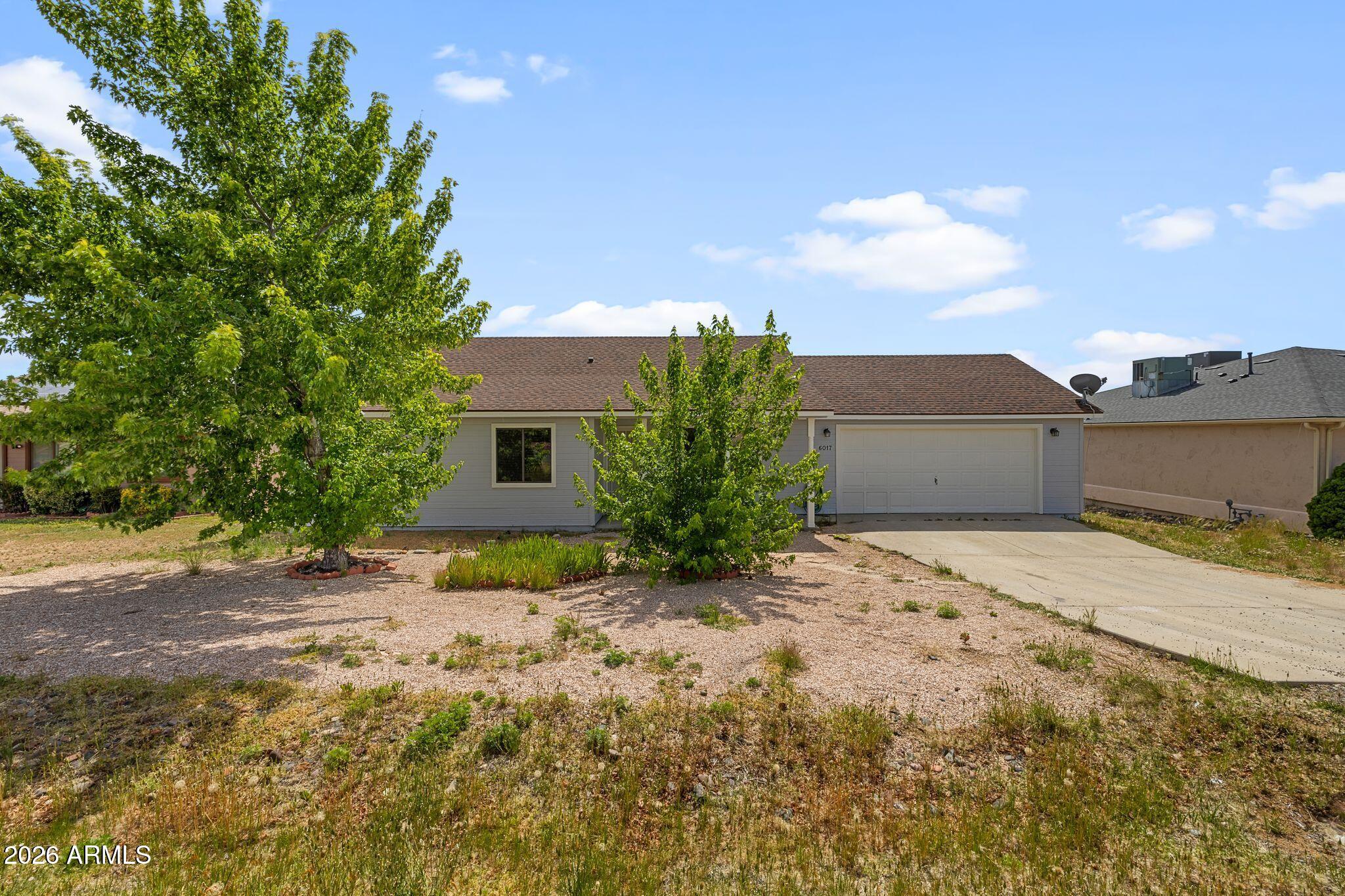 This 1,261-square-foot contemporary single-family home, built in 2000, offers a functional and inviting three-bedroom, two-bathroom layout in a prime Prescott Valley location. Situated on a spacious 0.19-acre lot, the property features durable construction with a composition roof and energy-efficient double-pane windows for year-round comfort.Inside, you'll find a well-designed floor plan complemented by granite kitchen countertops and ample living space, ideal for both everyday living and entertaining. The large backyard provides a blank canvas to create your own outdoor retreat--perfect for gardening, relaxing, or hosting gatherings.Conveniently located with easy access to Highway 89A, this home combines comfort, practicality, and accessibility. Seller offering $7,250 credit to closing.