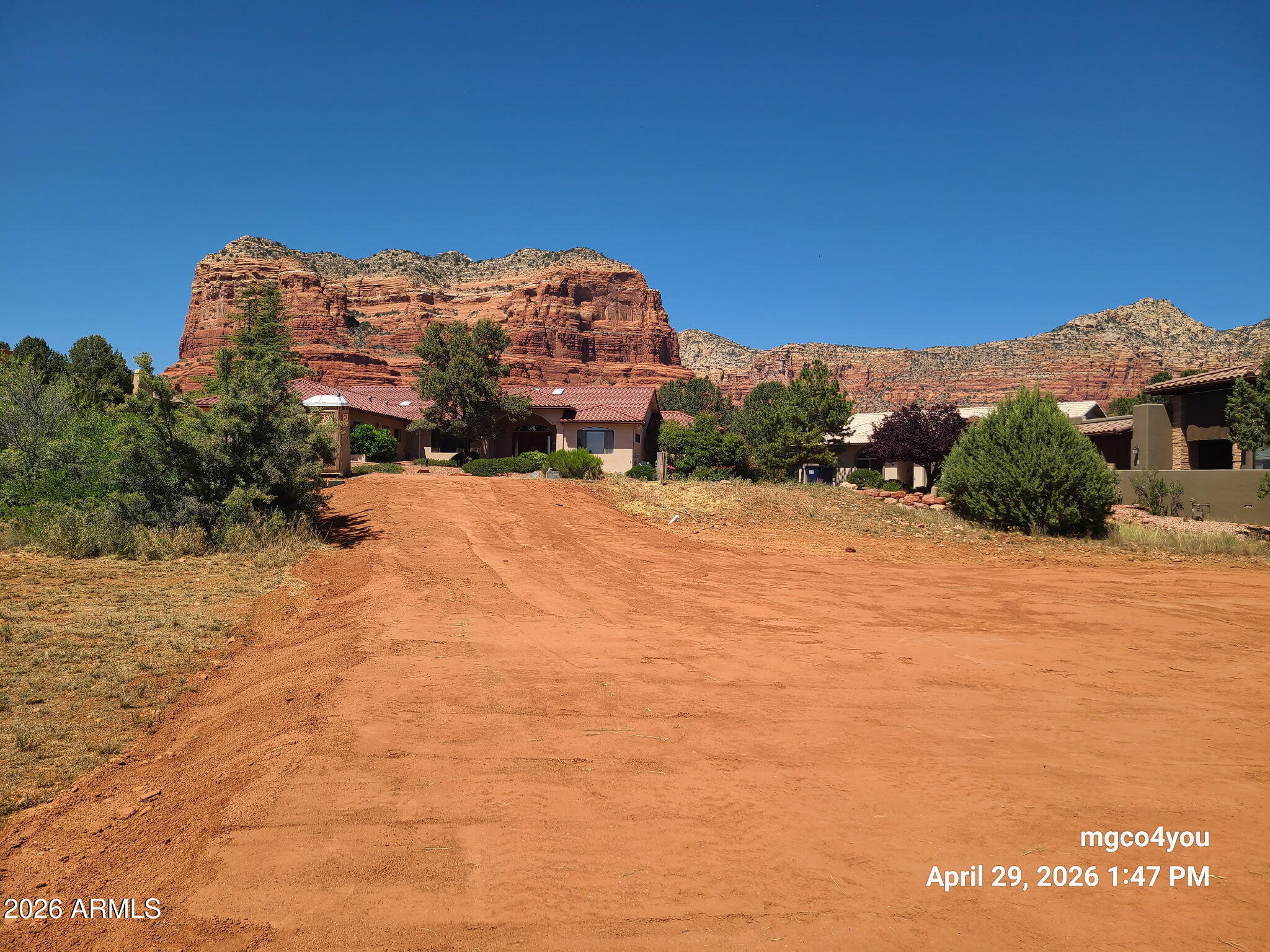 Build Your Sedona Dream-Without the Wait. Fully approved permits are already in place, so you can break ground on day one, no delays, no headaches, no guesswork. The grading is complete and the homesite is ready for your foundation, making this an ideal opportunity for an owner-builder or savvy investor looking to move fast. Set in the prestigious Village of Oak Creek, this oversized 0.32-acre lot offers the rare chance to build in one of Sedona's most sought-after upscale communities. Your future backyard backs to a natural seasonal stream--perfect for quiet mornings, peaceful evenings, and a true connection to nature. Take in expansive 360 panoramic views from your roof top covered patio. The surrounding views create a breathtaking backdrop for your custom home!