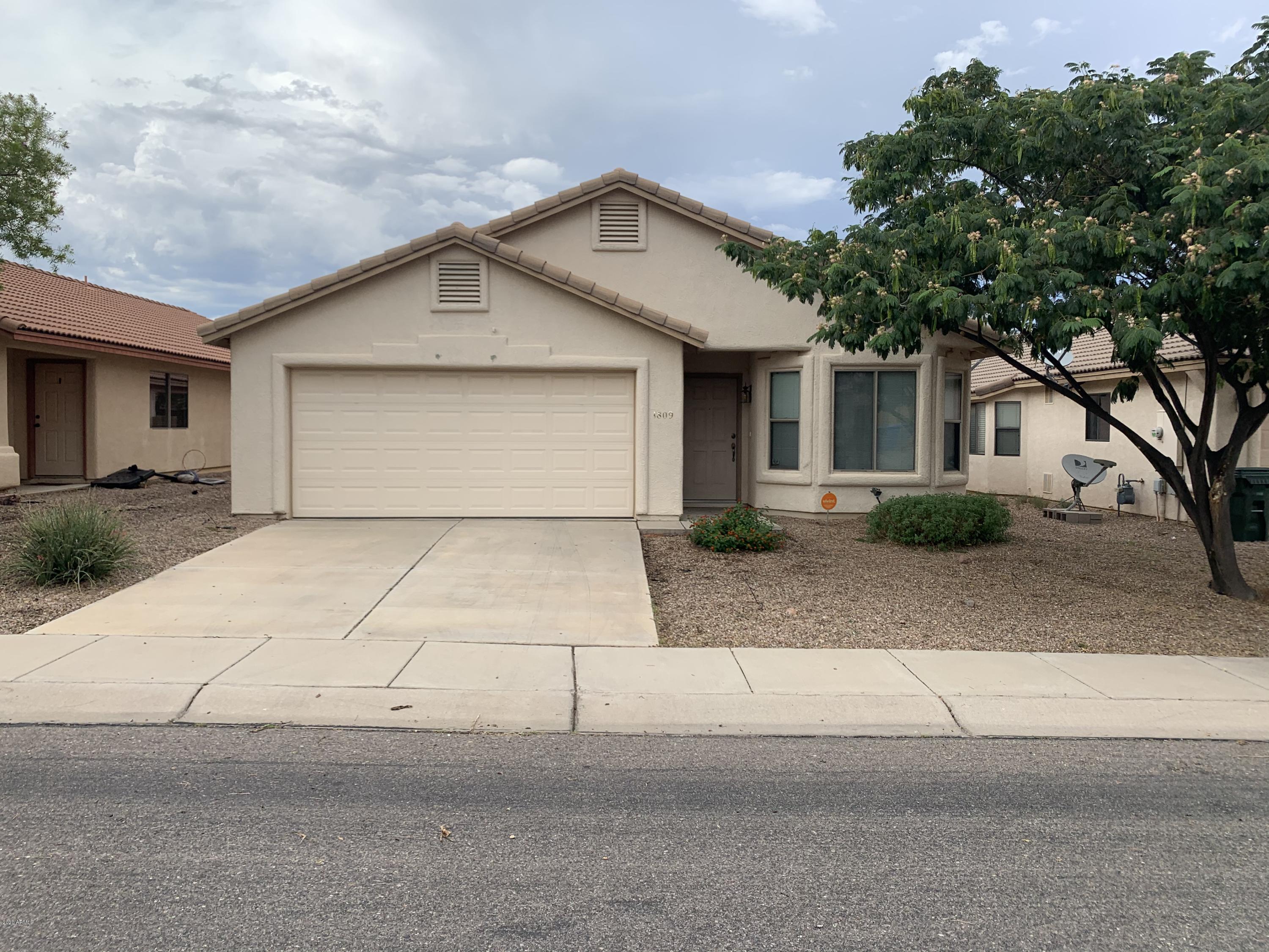 This 3BD/2BA/2CG 1648 sf rental property in the Silverado subdivision located in Sierra Vista, AZ is close to Fort Huachuca, shopping, and schools. This cozy home has tiled floors with carpets in the living area and bedrooms, a walk-in master shower and a tub, dual master bathroom sinks, a spacious family room, and a covered patio with a low-maintenance front and backyard. This rental home will not last long! Please call to schedule a showing today.