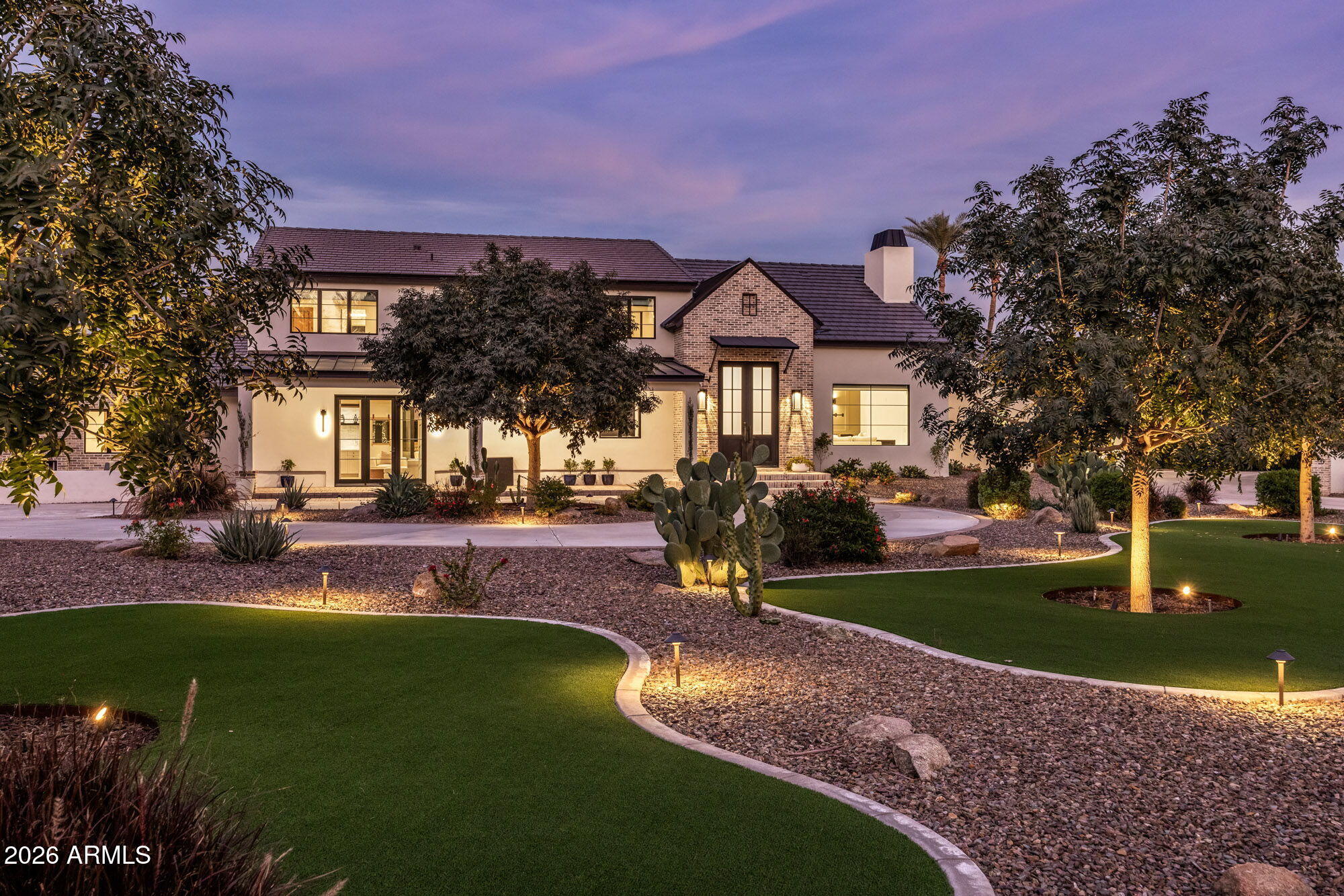 Set within one of Paradise Valley's most coveted enclaves, this fully renovated 2024 estate offers 7,722 sq ft of elevated modern transitional living on a generous 1.22-acre parcel. Natural light, clean architectural lines, and a refined palette of stone and wide-plank wood floors create a home that feels both sophisticated and welcoming from the moment you enter.

At the center of the home, the chef's kitchen is designed to gather--featuring premium Gaggenau appliances with gas and induction cooking, expansive stone surfaces, and a statement island that anchors the main living space. Walls of glass connect the interior to the outdoors and invite seamless indoor-outdoor living, making everyday life feel resort-like and entertaining effortless. The layout offers exceptional versatility with five en-suite bedrooms, 6.5 baths, a dedicated office, fitness room, and dual laundry roomsideal for families, guests, and extended stays. Outside, enjoy a sparkling heated pool, fire feature, outdoor kitchen, dining and lounge destinations, and a private pickleball court. With generous grounds and future development potential (plans available), this is a rare turnkey Paradise Valley retreatequally compelling as a primary residence or sophisticated international escape.