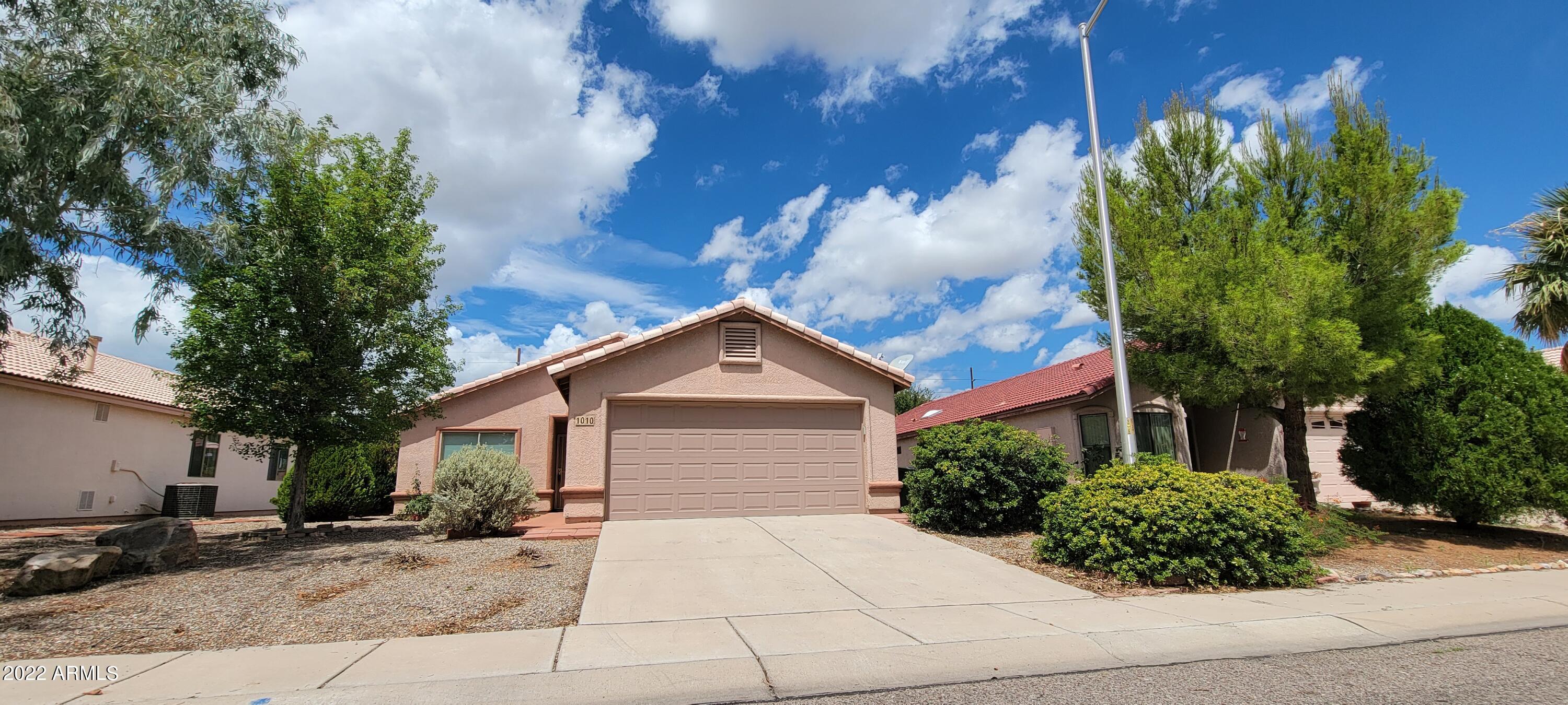 With prices going thru the roof, here is an opportunity to purchase a newer home and a great price ! This cute home has ceramic tile or laminate flooring through out the home making it very easy care. There is a large front room that could be a living/dining room or a large living room. There is a good size breakfast nook of the kitchen too. The master suite includes a large walk in closet and private bath. There is also a laundry room inside the house. The back yard includes a covered patio and low maintenance landscaping and a view of the mountains. Call me today for your private showing!