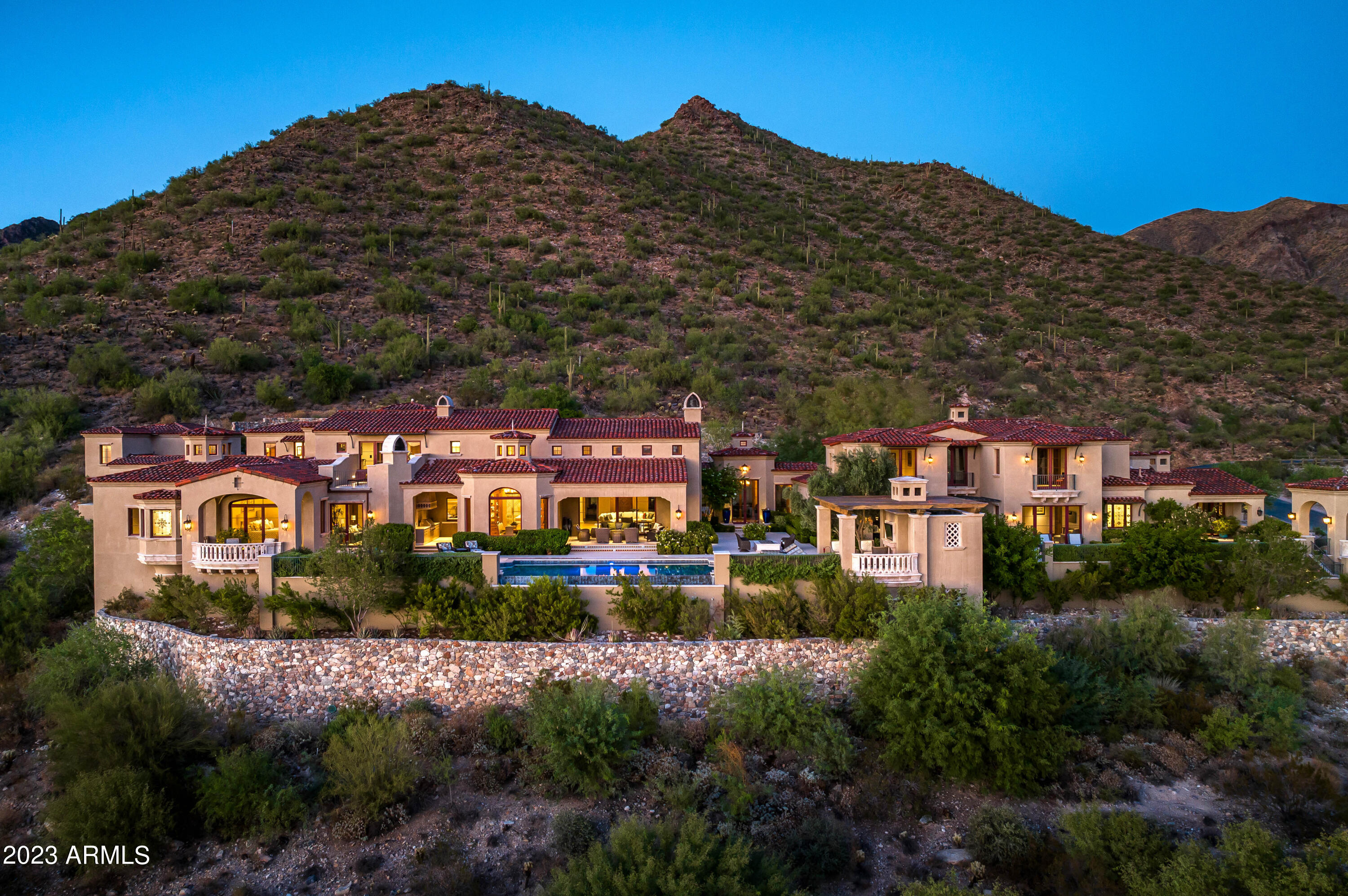 Motivated Seller and SILVERLEAF GOLF MEMBERSHIP opportunity available. Nestled within the prestigious Silverleaf community's Upper Canyon, this magnificent Mediterranean Estate is a testament to extraordinary craftsmanship and design. Spanning an impressive 13,272 square feet, this residence offers unrivaled vistas of the cityscape, mesmerizing sunsets, and the majestic mountains of Scottsdale, Arizona. Crafted through a seamless collaboration between the visionary Mark Candelaria of Candelaria Design, the master builder John Schultz of Schultz Development, and the renowned interior designer Isabel Dellinger Candelaria of Earth and Images, this home radiates elegance at every turn. The result is a sophisticated sanctuary, decorated with the finest luxury finishes and meticulous attention to detail. The thoughtfully designed great room floor plan provides a harmonious flow, separating the principal suite from the guest wing of the home with a private entrance hosts five generously appointed en-suite guest rooms, each boasting king-sized accommodations. This layout offers both privacy and comfort for residents and guests alike. Step outside to discover a breathtaking outdoor oasis, featuring a captivating negative edge pool, a generous spa for ultimate relaxation, and multiple inviting seating areas set amidst flawlessly manicured gardens. This al fresco retreat is an idyllic backdrop for intimate gatherings or grand-scale entertaining. Embodying the pinnacle of architectural excellence in the esteemed Silverleaf community, this Mediterranean Estate offers an unparalleled lifestyle of luxuriousness, elevated by its breathtaking natural surroundings. This is a residence that redefines luxury living in Scottsdale, Arizona.

Silverleaf, located in North Scottsdale, Arizona, is a prestigious guard gated community known for its luxurious estates, exclusive golf courses, private Club and stunning desert landscapes. The Tom Weiskopf-designed Silverleaf Golf Course is a highlight for golf enthusiasts. With a blend of Spanish and Mediterranean-inspired architecture, the community offers a high standard of living, including upscale amenities like spas, fine dining, and exclusive shopping. Residents enjoy a harmonious balance between modern luxury and the natural beauty of the desert environment, making Silverleaf a sought-after destination for those seeking an exceptional lifestyle in North Scottsdale.