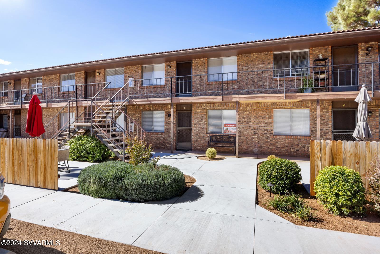 INVESTOR ALERT!  This 8 unit apartment complex is located in beautiful Uptown Sedona, walking distance to all of the shops/restaurants/galleries with views of Snoopy Rock and beyond.   This building was built and owned by same owner/builder-family since 1971.   Has always been fully rented.   Owner recently remodeled 4 of the 8 units.   Two units are fully furnished if new buyer wishes to do monthly furnished vacation rentals.   Minimum 30 day rentals.   Would make great workforce housing for any local resort, hotels, restaurant groups, etc.   
Or continue on as long term or monthly rentals.   Well built, well maintained investment opportunity!  There are seven 2-bedroom/1-bath units, one 1-bedroom/1-bath unit.     Call listing agent to view this rare opportunity in Uptown Sedona!