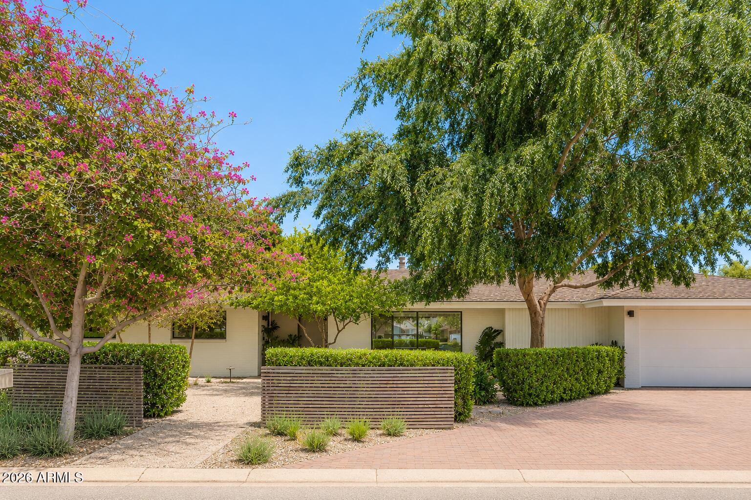 Nestled on a quiet cul-de-sac between the coveted 7's, this completely renovated property blends timeless design with effortless indoor-outdoor Phoenix living. The thoughtfully designed main residence (3,585 SqFt) features 5 bedrooms and 4.5 bathrooms, including a split primary suite layout that offers a true retreat from the rest of the home.

Designed for both everyday living and exceptional entertaining, the open floor plan seamlessly connects the kitchen, dining space, and living areas. Large glass doors open to a resort-style backyard featuring a fully tiled pool, lush mature landscaping, and multiple gathering spaces that create a true oasis in the heart of North Central Phoenix.

The detached casita (582 SqFt)  provides ideal accommodations for guests, extended family, a home office, pool house or fitness studio. Set on one of the neighborhood's most peaceful streets, this move-in ready property offers the rare combination of privacy, functional living, and location in one of Phoenix's most desirable enclaves.