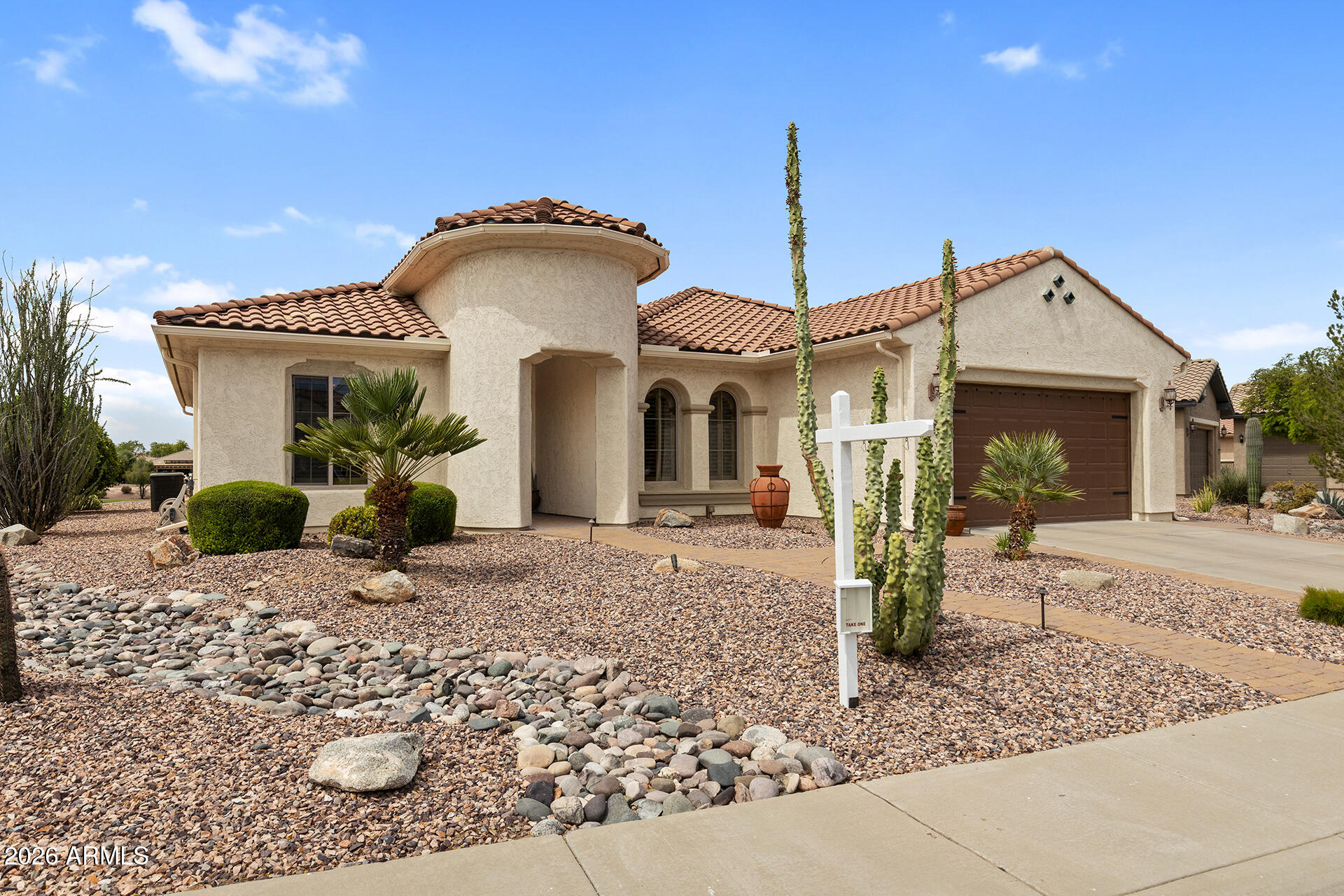 Retire in style and enjoy luxury, comfort, and community in this fully furnished 3-bed, 2.5-bath home located in a vibrant golf course adult community! Designed with a split floor plan, this home showcases custom paint, elegant tile and hardwood flooring, and thoughtfully designed living spaces. The gourmet kitchen is sure to impress with built-in double ovens, a center island, granite countertops, and a breakfast bar perfect for gathering and entertaining. Step outside to your private backyard retreat featuring stunning sunset views, a relaxing hot tub, gas fire pit, oversized bar, built-in BBQ, custom lighting, and mature cacti creating the ultimate outdoor experience. Beyond the home, enjoy resort-style amenities including a lap pool, oversized outdoor pool, fitness center and more. indoor walking path, volleyball, and more. This isn't just a neighborhood--it's a lifestyle. Experience active, comfortable, and serene living in a community you'll love!