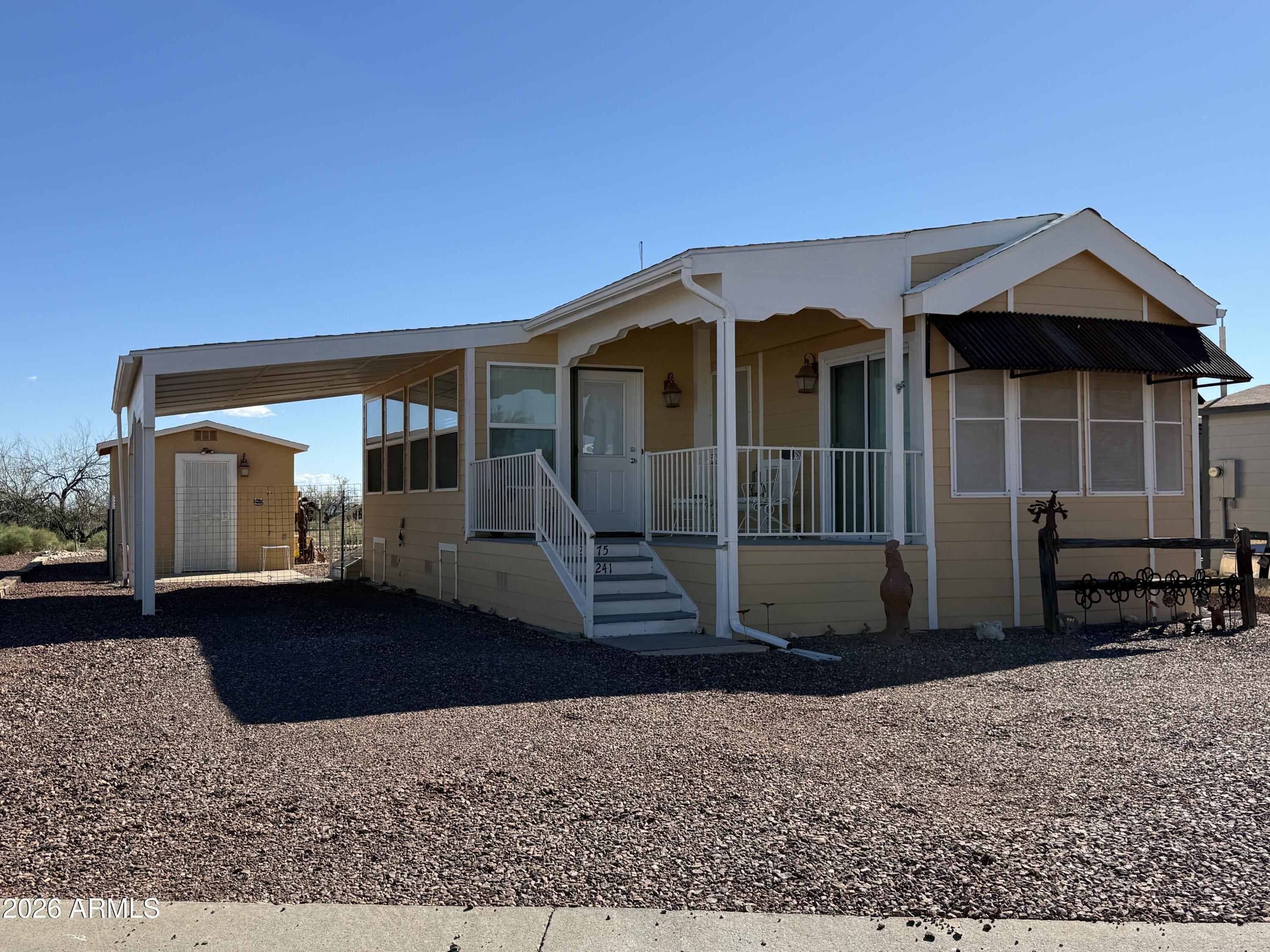 **Welcome to Your Desert Retreat !
Discover the perfect snowbird escape nestled along the edge of Arizona's stunning state land. This cozy 1-bedroom, 1-bathroom tiny home offers 570 SF of comfortable living space, ideally suited for those seeking sunshine, simplicity, and wide-open skies. Shed with Laundry and Work Bench. Shed extension offers more space for outdoor toys
Step outside your door & the adventure begins immediately. With direct access to public land just steps away, your mornings can start with peaceful walks through the untouched Sonoran landscape, where desert wildflowers, native wildlife, and breathtaking panoramic views greet you at every turn. The outdoor space surrounding this property is nothing short of spectacular -- sweeping vistas stretch across the rugged terrain