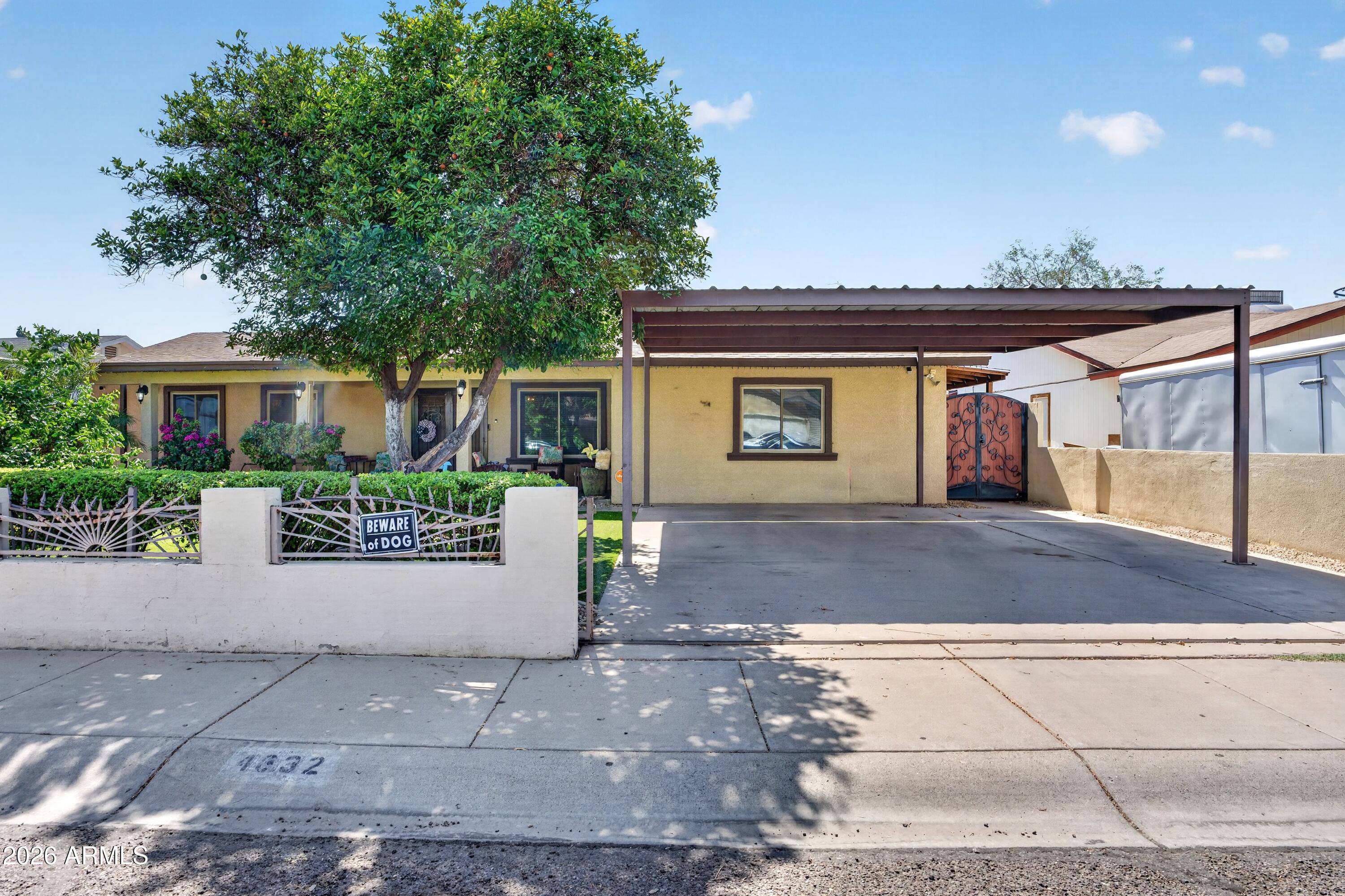 Welcome to this spacious 4-bedroom, 2-bath home in the heart of Phoenix's Maryvale community. Offering over 2,000 sq ft of living space, this property features a bright family room with a cozy fireplace, an open kitchen, and a separate laundry room. The converted garage adds versatile bonus space -- perfect as a home office, playroom, or additional living area. Out back, you'll find a private build-out room separate from the main home, along with a diving pool with its own bar and a fenced backyard ideal for entertaining. With additional parking and low-maintenance landscaping, this home is conveniently located near schools, shopping, and Maryvale Baseball Park.