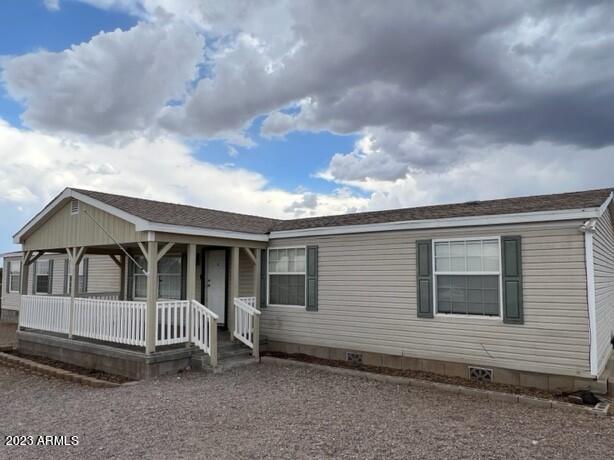 COUNTRY LIVING at it's FINEST with AMAZING MOUNTAIN VIEWS! This 4Bd/2BA open floorplan home sits on 4.35 fenced acres with a round pen and shelter for your horses or animals. Enjoy the cool breeze and watch the clouds roll in on the front covered patio! The HUGE Master Suite boasts a walk-in closet plus a Bonus Area to use as a sitting area, office, work-out area or??? The large master bathroom features double sinks, a garden tub & separate shower. Three of the 4 bedrooms have walk-in closets! Enjoy the cozy fireplace in the family room or step outside for a BBQ with your new neighbors in the block privacy fenced backyard. Come take a look at this gem and see if it is the home for you!