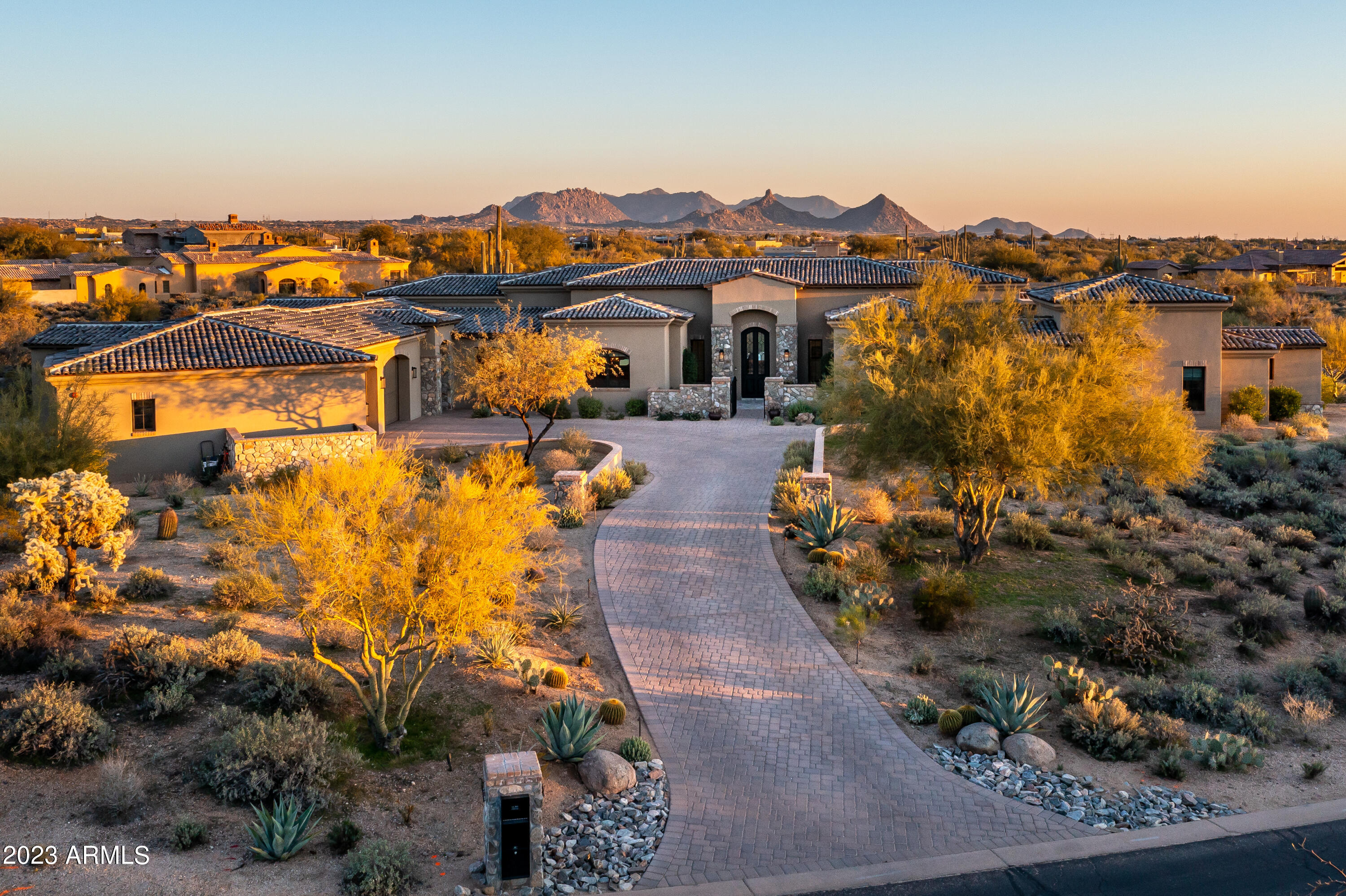 Stunning home built in 2020 located in Whisper Rock Estates in North Scottsdale, AZ. Situated on a South-facing 2.95 acre lot, the home features an open GREAT ROOM floor plan with no interior steps. Enjoy three en-suites in the main home, a study and a separate casita with private entry, bedroom, full bath and kitchenette. Expansive outdoor living includes large covered patio, heated pool, spa, fireplace, fire pit, large artificial grass area, bbq and a Alfredo built-in gas pizza oven with custom stone and tile enclosure. Custom finishes include natural stone & wood flooring, quartz/guartzite counter tops, wood beamed ceilings & automated lighting and custom blinds. Ample three car garage with EV outlet, storage room, water softener and reverse osmosis filter. Continued under ''more'' Custom wine storage has 330 bottle capacity with temp alarm-custom walnut and brushed nickel racking system with brick backing and LED lighting - separate 1/3 ton cooling system with temperature alarm connected to house monitoring system. The home also has Five Trane Heat pumps (manufactured in 2020) one 2 ton, two 3 ton and  two 4 ton units. Additionally there are four tankless hot water heaters in the home. Enjoy great views of the Mcdowell mountains, Pinnacle Peak and classic Arizona sunsets
On-site amenities at Whisper Rock include fitness facility, heated lap pool & spa, tennis courts, and pickle ball courts. Whisper Rock also offers social & recreational programs that don't require you to leave the neighborhood, such as signature parties, happy hours,  community dinners and holiday celebrations.