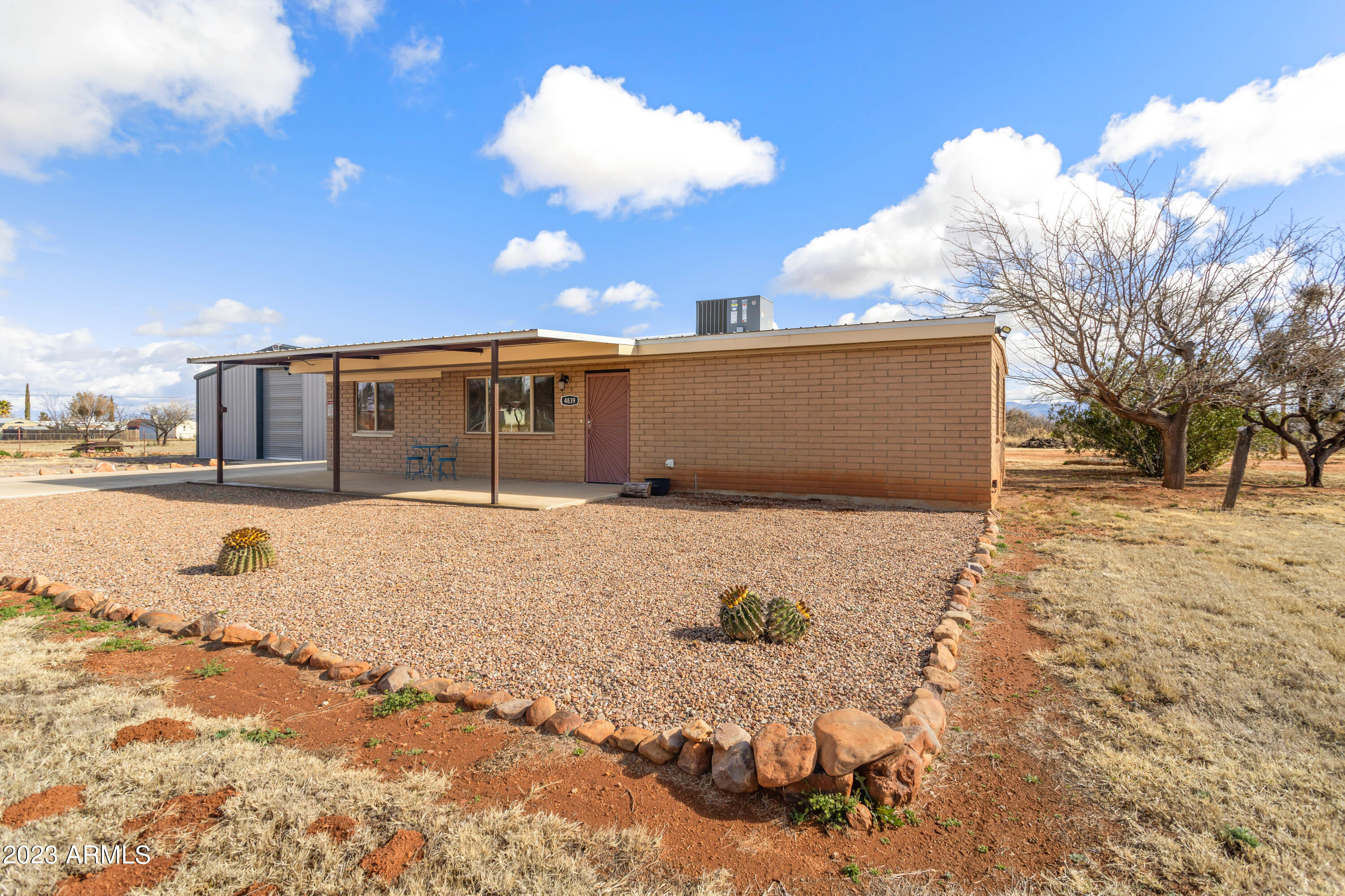 Need a SHOP and a house?? Look no further!!  
2 bd,1 bth remodeled home on 1 acre. Some handicap amenities already installed. Front & back patios have steel awnings. Bonus room for crafts, hobbies or even a 3rd bedroom possible. Spacious pantry/laundry room. Low maintenance yard. 100 ton of crushed asphalt on property for future drive. 
House features all new HVAC system, LP gas range, tank-less water heater, flooring, Low E efficiency windows throughout, insulated metal roof and more. 
3880 (40X97 built 2019) sf steel building (shop). Features three garage doors, one each on the west, south and north sides. Has LED lighting and plumbed for air complemented by a 60 gal compressor, Transom windows & 10K 2 post auto lift. Call for a private showing today!