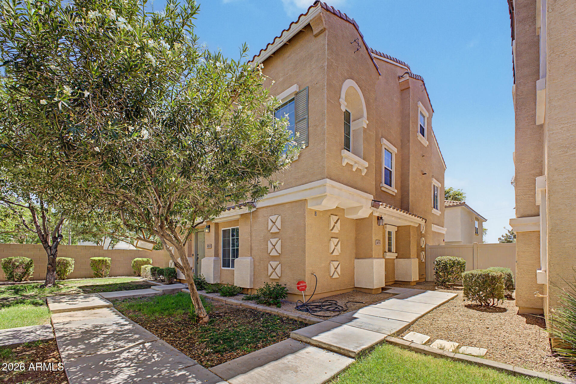 Welcome home to this beautifully maintained 3-bedroom, 2-bath, 1,463 sq. ft. three-story townhome in the highly desirable Gardens community in Gilbert! Ideally located near shopping, dining, parks, schools, Toka Sticks Golf Club, and with easy access to Loop 202, this home combines comfort and convenience. Pride of ownership shines throughout with 20-inch tile flooring on the first level, warm wood flooring on the second, and plush carpet in the third-floor loft. The upgraded kitchen features stainless steel appliances, granite countertops, crown-molded cabinetry, and a breakfast bar that opens to the main living area. The spacious primary suite offers abundant natural light, a walk-in closet, granite vanity, and a beautifully tiled walk-in shower. Additional highlights include upgraded lighting and ceiling fans, a custom-tiled secondary bath, elegant spiral staircase leading to the loft, and 2-inch blinds throughout. Residents enjoy resort-style amenities including three heated pools, tennis and basketball courts, playgrounds, and beautifully maintained parks, making this an exceptional opportunity to enjoy the best of Gilbert living.