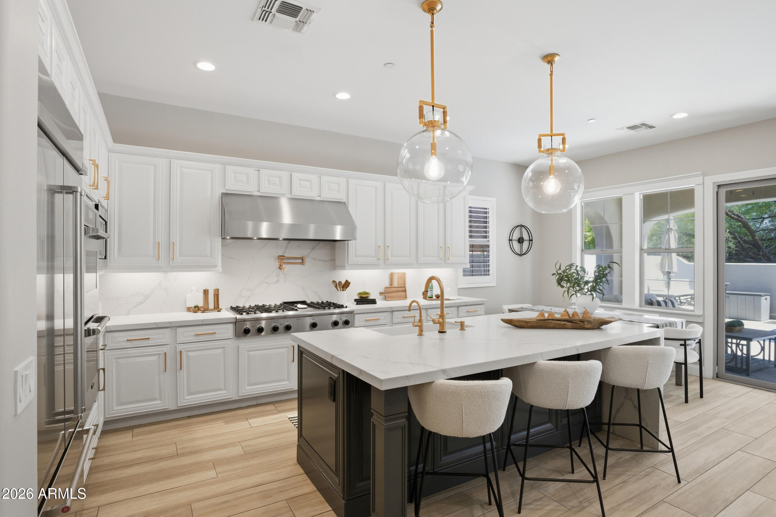 Nestled within the gated enclave of The Terrace Homes East in DC Ranch, this stunning residence offers the perfect blend of sophistication, comfort, and resort style living. Situated on a cul de sac lot with north/south exposure, the home showcases abundant natural light, plantation shutters, and designer finishes throughout. The chef's kitchen is beautifully appointed with quartz countertops, stainless steel appliances, double ovens, 6 burner gas cooktop with griddle, large island with waterfall edge, under cabinet lighting and a spacious walk-in pantry. The flexible design offers exceptional versatility, with a separate loft space and dedicated office. The secluded primary retreat serves as a luxurious sanctuary, complete with private balcony access, inviting en suite bath featuring a soaking tub, walk-in tile shower, dual vanities, and two oversized walk-in closets. Enjoy the heated pool & raised spa with tranquil water features. Relax  in the cozy courtyard with a gas fireplace. Residents of DC Ranch are privy to all community activities and amenities including parks, walking trails, pickle ball & tennis courts and a newly renovated community center with fitness center and lap pool. Ideally located within minutes to scenic hiking and biking trails, world class golf, premier dining, shopping, events like Barrett Jackson & Phoenix Open and offering easy access to the Loop 101. This exceptional residence delivers the ultimate Scottsdale lifestyle.