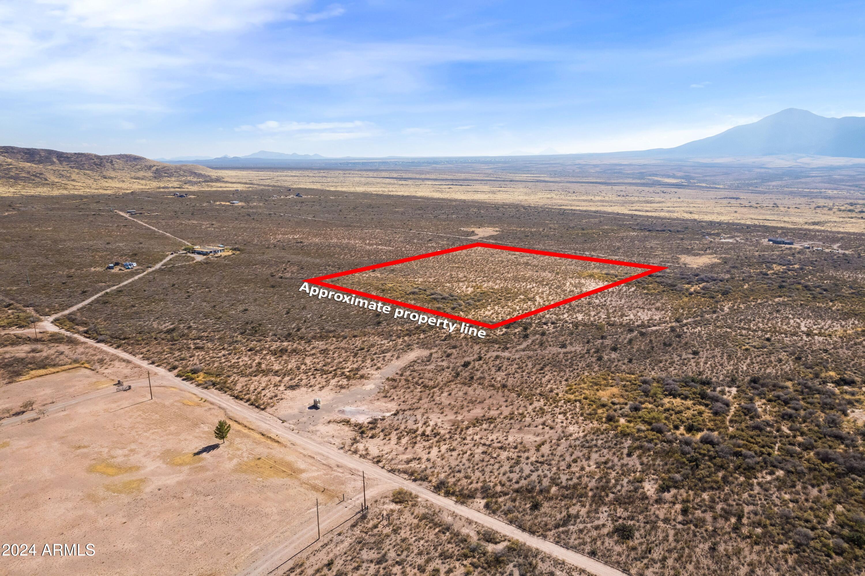 This parcel has a 1/4th well share provided by a recently drilled well.  A great parcel of land for Arizona living on this 7.1-acre lot with spectacular mountain views of the Mule and Huachuca Mountains. There is plenty of State, BLM, and National Forest lands to explorer nearby for biking, hiking, and bird watching to name a few activities.. Flexible RU-4 zoning allows for various homes: site-built, manufactured, tiny. barn dominium. County zoning allows horses and barn animals. Conveniently located off Highway 92 with a short comminute to the free-spirited vibe of the quaint town of Bisbee. No HOA or restrictions! Build your dream home or any desired construction on this lot. Opt out building permitted for no permits if desired per Cochise County guideline